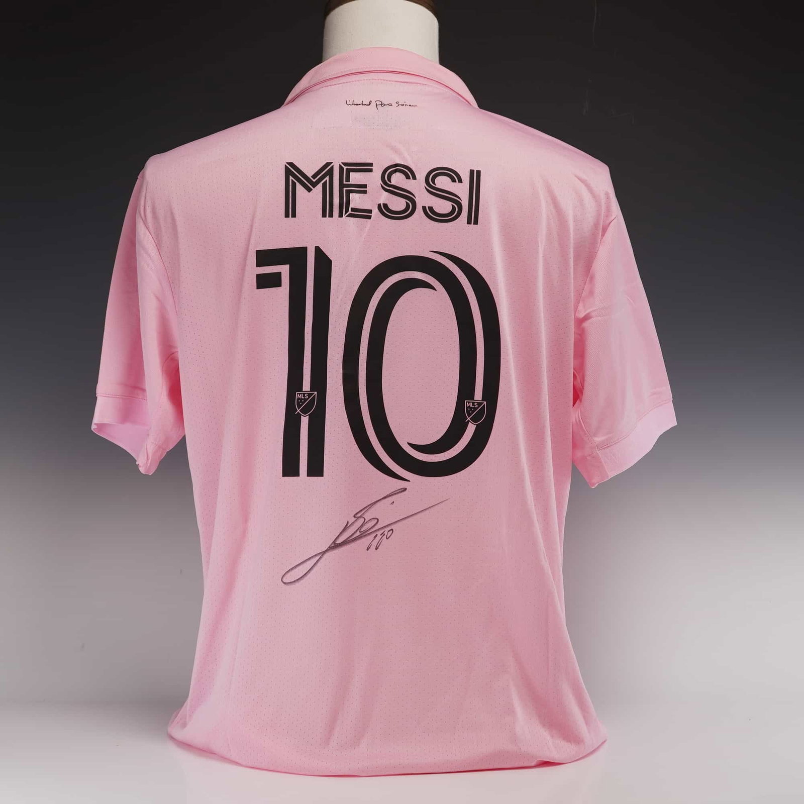 Lionel Messi Signed Inter Miami CF 2022-23 Home Jersey with Icons.com COA: This is an official Adidas Inter Miami CF 2022-23 home shirt, known as "The Heartbeat Kit," featuring the team's signature pink color and black accents. The jersey displays the heat-pressed Inter Miam