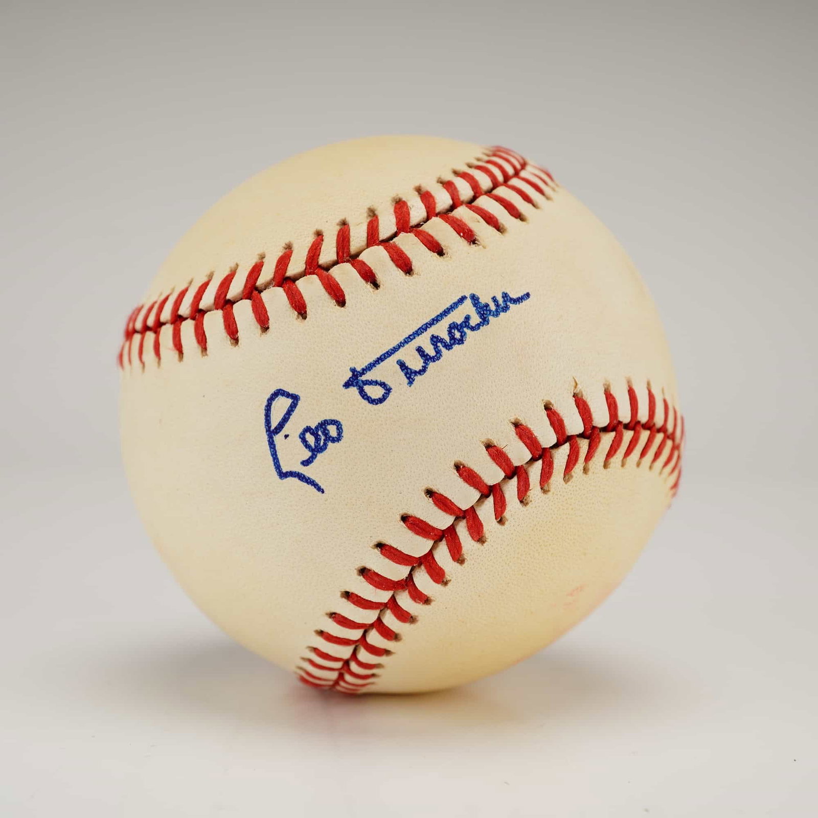 Leo Durocher Single-Signed Rawlings Official National League Baseball PSA/DNA Authenticated: This professional auction lot features a single-signed baseball from Hall of Fame manager and player Leo Durocher. The autograph is prominently placed on the sweet spot of a Rawlings Official National