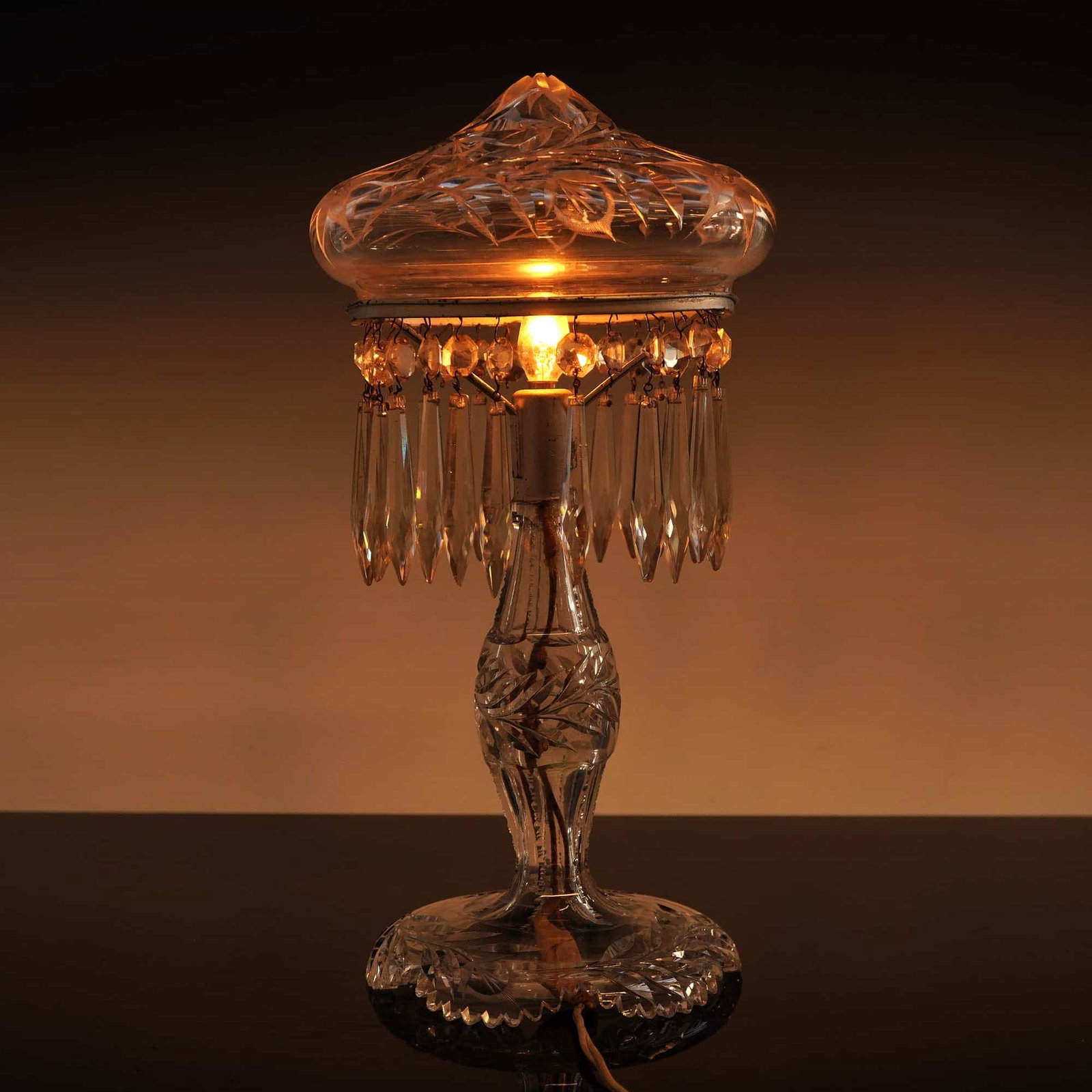 American Brilliant Period Cut Glass Mushroom Parlor Table Lamp: This early 20th-century lighting fixture is an unattributed example of the American Brilliant Period. The materials are confirmed to be an ABP cut glass parlor table lamp. It features a removable mush