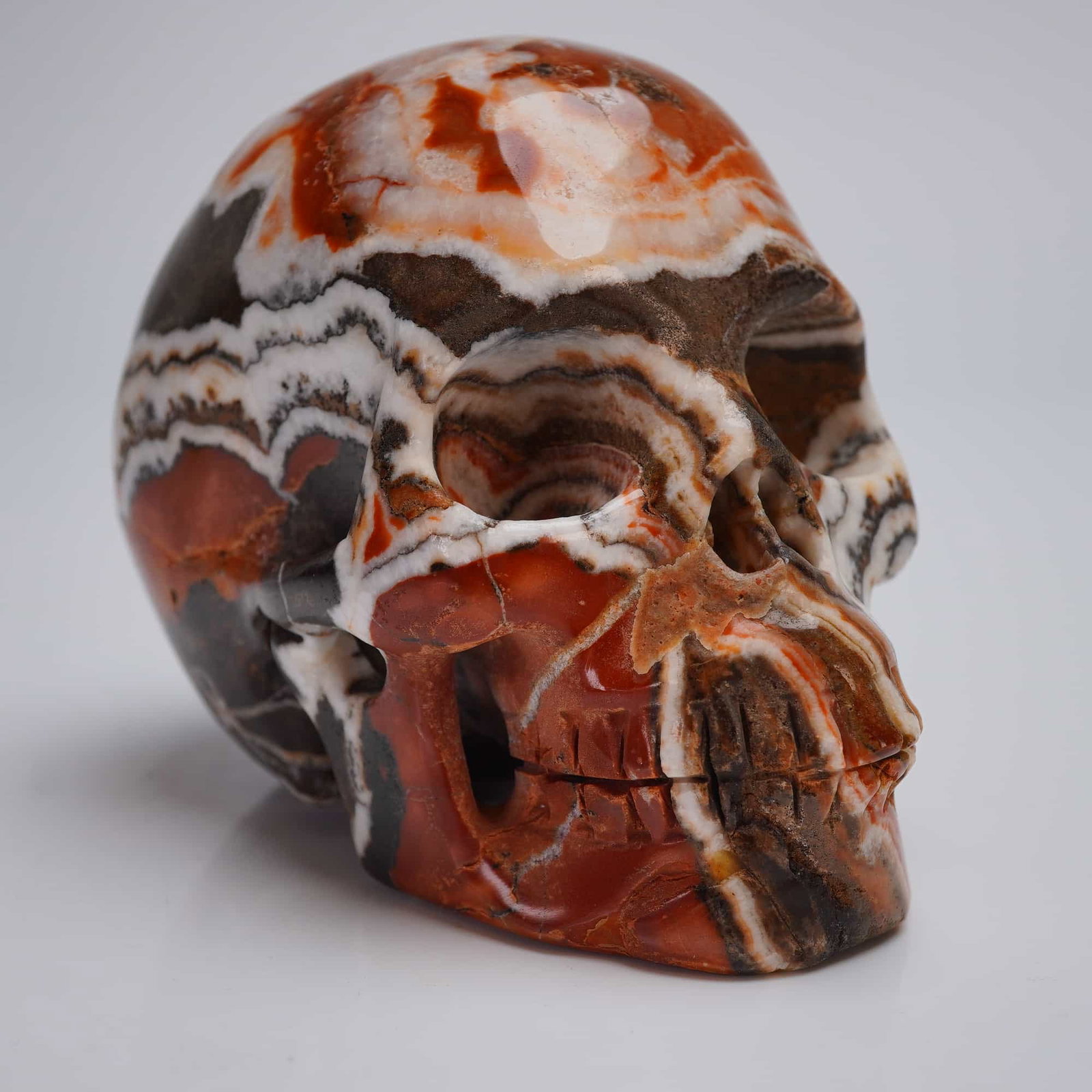 Crazy Lace Agate Carved Stone Skull (1 of 4)