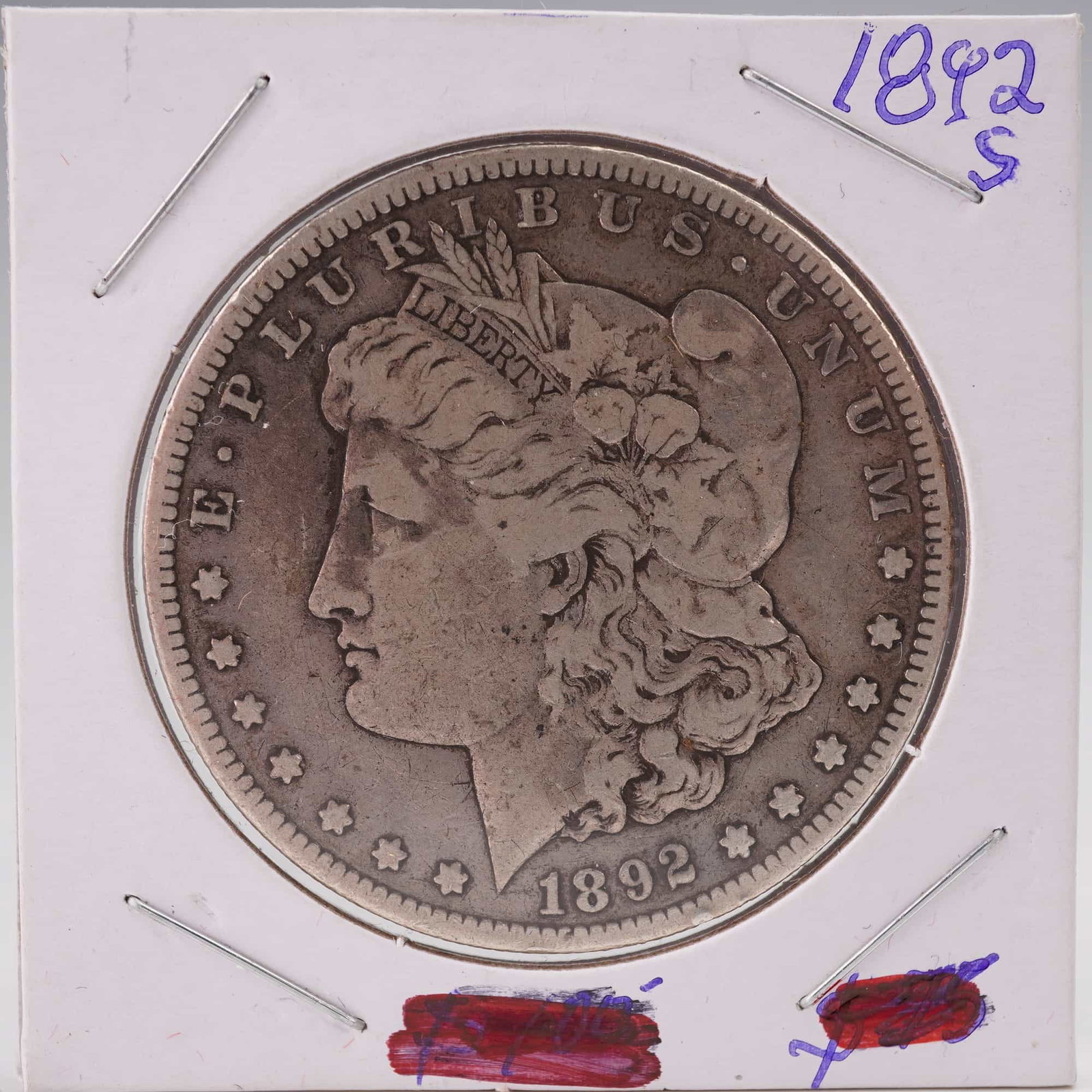 1892-S United States Morgan Silver Dollar: The Morgan dollar is a United States silver dollar minted from 1878 to 1904 and again in 1921. It was the first standard silver dollar produced following the Coinage Act of 1873 and contains 412.5 Tro