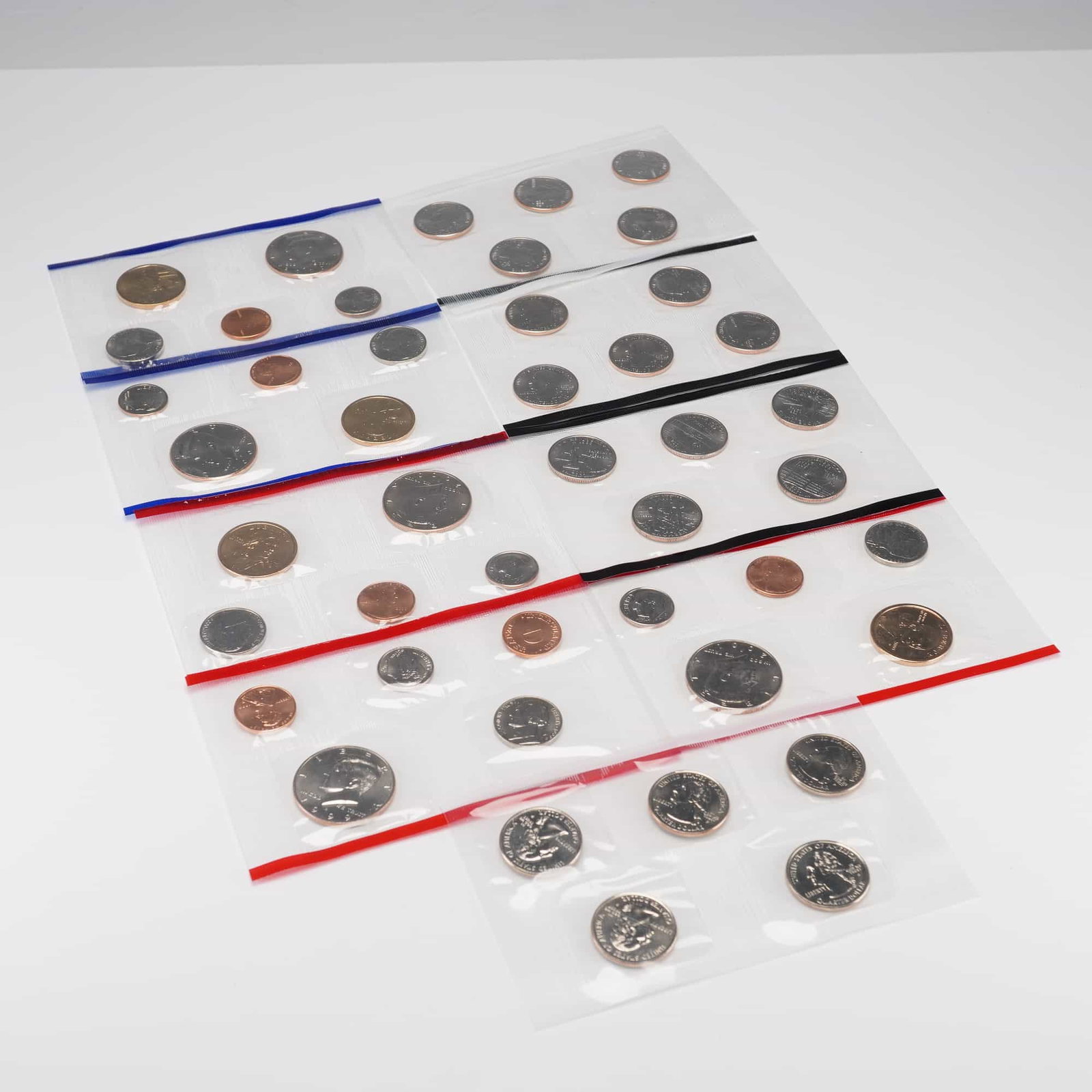 9pc 1999-2001 U.S. Mint Uncirculated Coin Sets plus State Quarters (1 of 10)