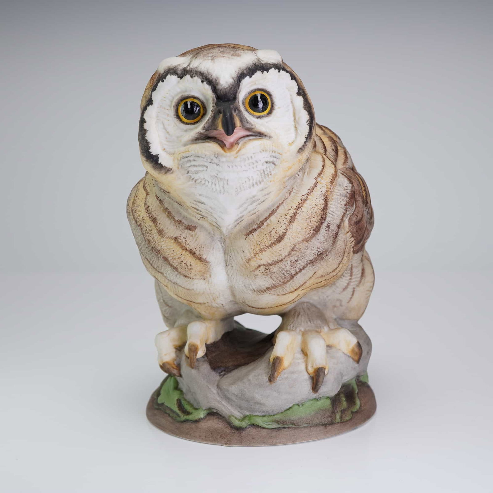 Boehm, Fledgling Great Horned Owl Figurine, Model 479: This fine hand-painted bisque porcelain figurine is produced by Edward Marshall Boehm, Inc. of the USA. The piece depicts a fledgling Great Horned Owl (Bubo virginianus Vir), designated as model numbe
