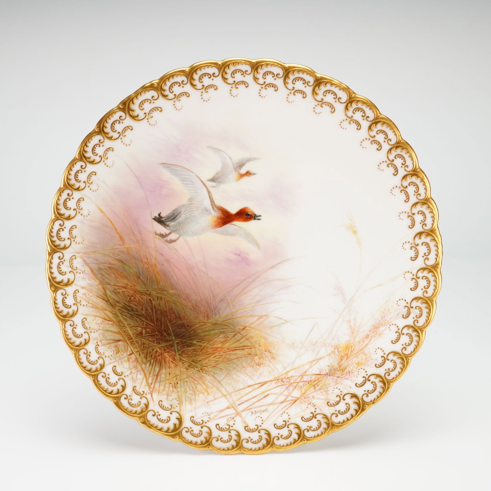 Cauldon for Tiffany & Co. Hand Painted Porcelain Game Bird Plate: This fine porcelain cabinet plate was manufactured by Cauldon Ltd in England and retailed by Tiffany and Co in New York. The circular form features a scalloped rim and a low gilded footrim. The centra