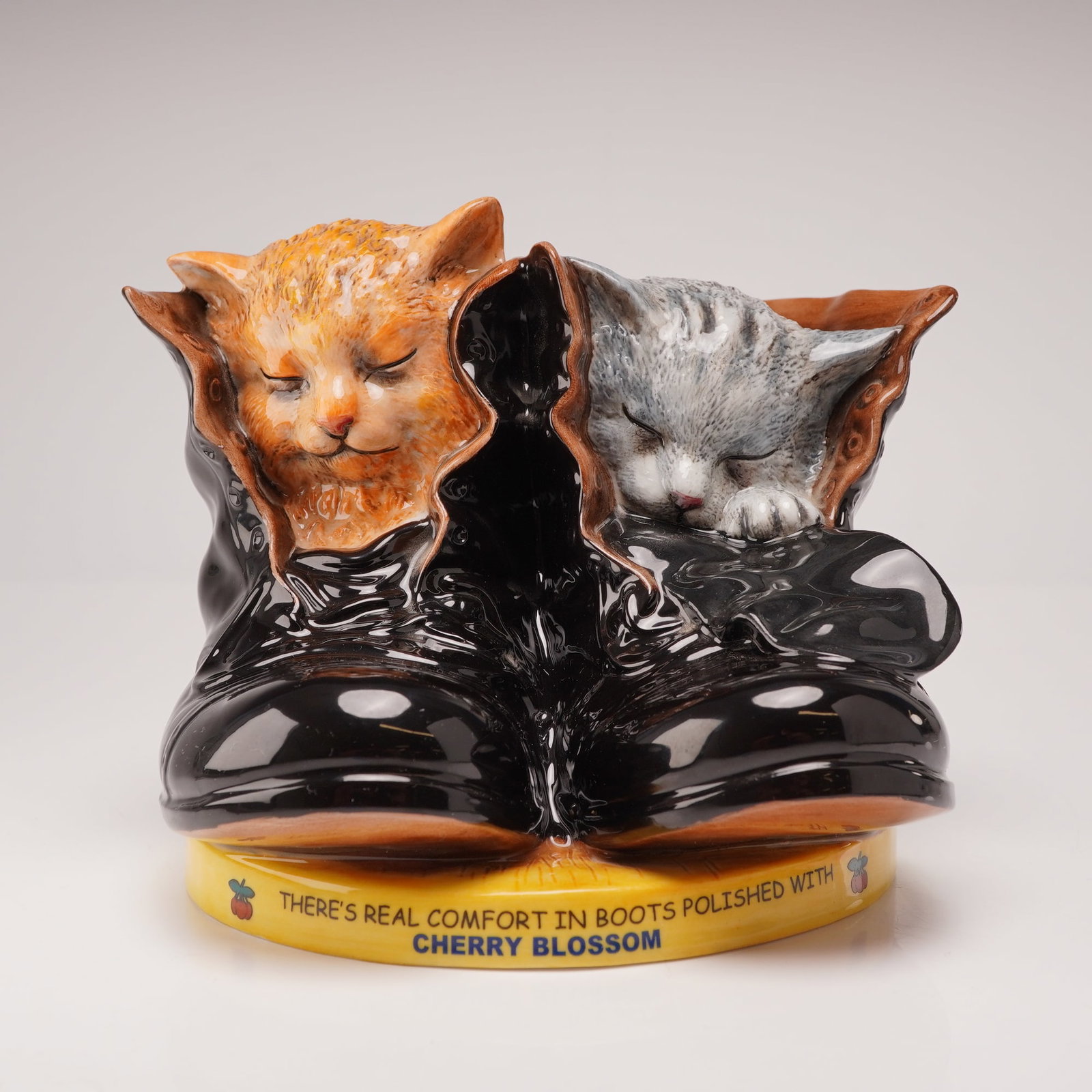 Royal Doulton Advertising Figurine, The Cherry Blossom Kittens MCL23: Cherry Blossom has been a leading brand of shoe and boot polishes for over a century, with some of its most memorable advertising campaigns featuring kittens. This limited-edition example, numbered 33