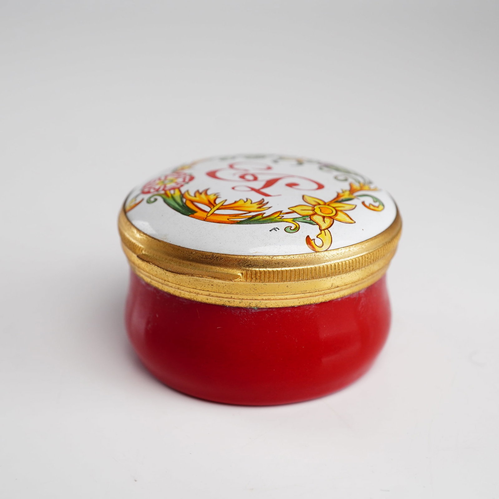 Crummles Handpainted English Enamel Limited Edition Treasure Box, Golden Wedding Commemorative: A Crummles and Co. handpainted English enamel treasure box, produced as a limited edition commemorative for the Golden Wedding of Queen Elizabeth II. The circular box features a vibrant red enamel bod