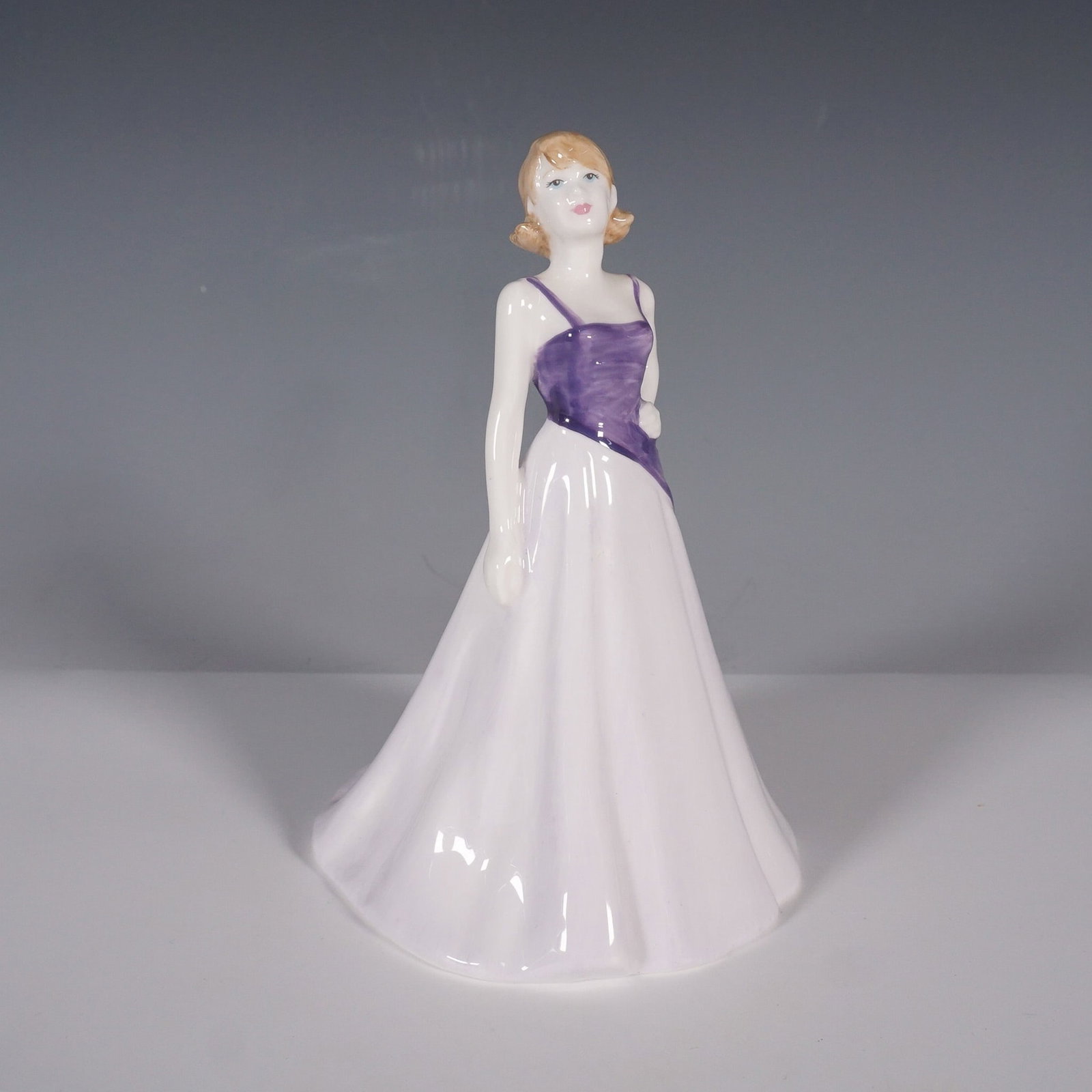 Royal Doulton Free Spirit Figurine " HN4609: The Free Spirit figurine (HN4609) was issued between 2004 and 2005 as part of Royal Doulton's Charity (Breast Cancer) series. Designed by Nada Pedley, this hand-painted bone china piece features a you