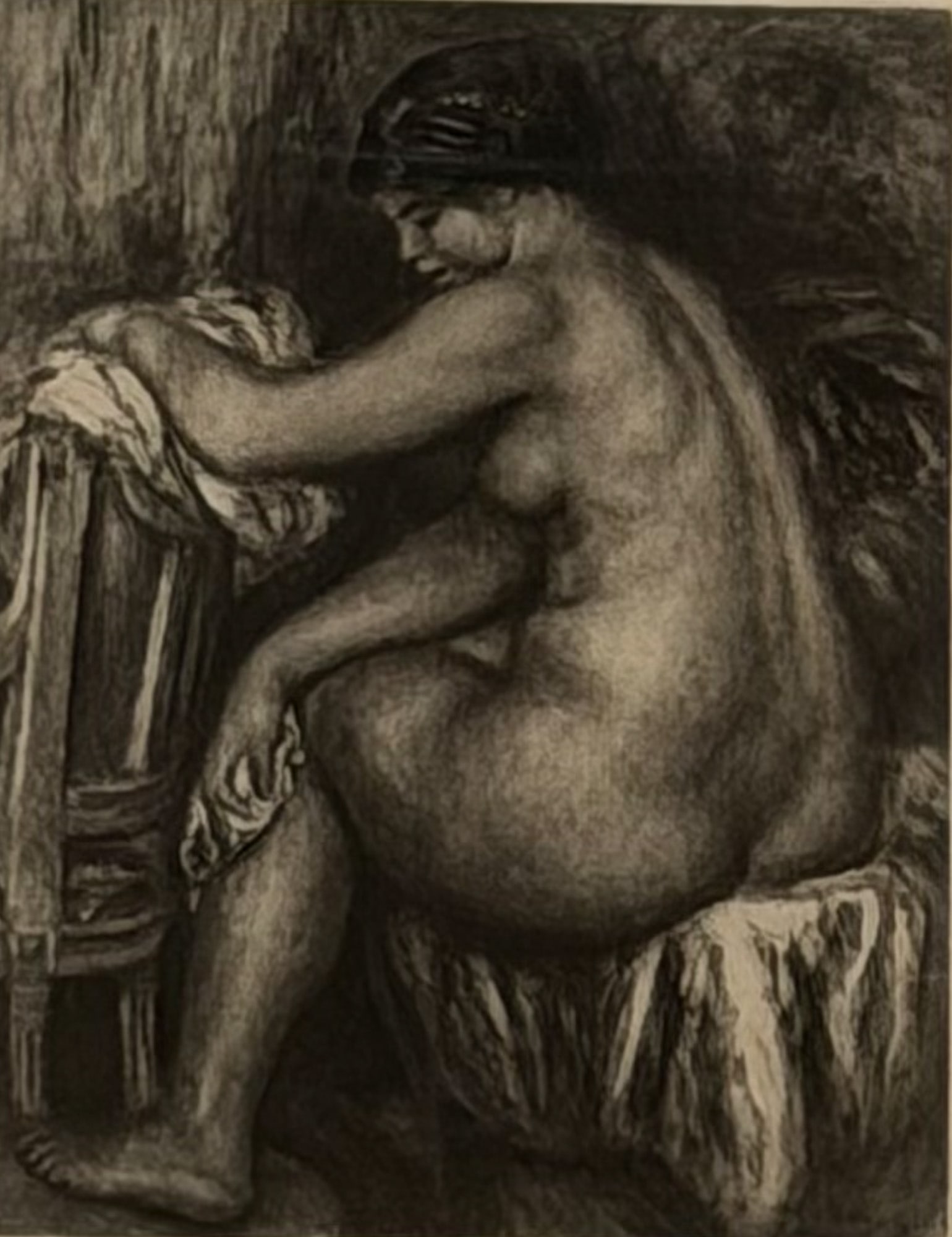 Pierre Auguste Renoir (French, 1841-1919) Heliogravure on Paper, The Seated Bather, Signed in Plate: This heliogravure on paper, titled The Seated Bather, is by French artist Pierre Auguste Renoir. The intaglio print depicts a seated female nude in profile leaning against a chair, a recurring subject