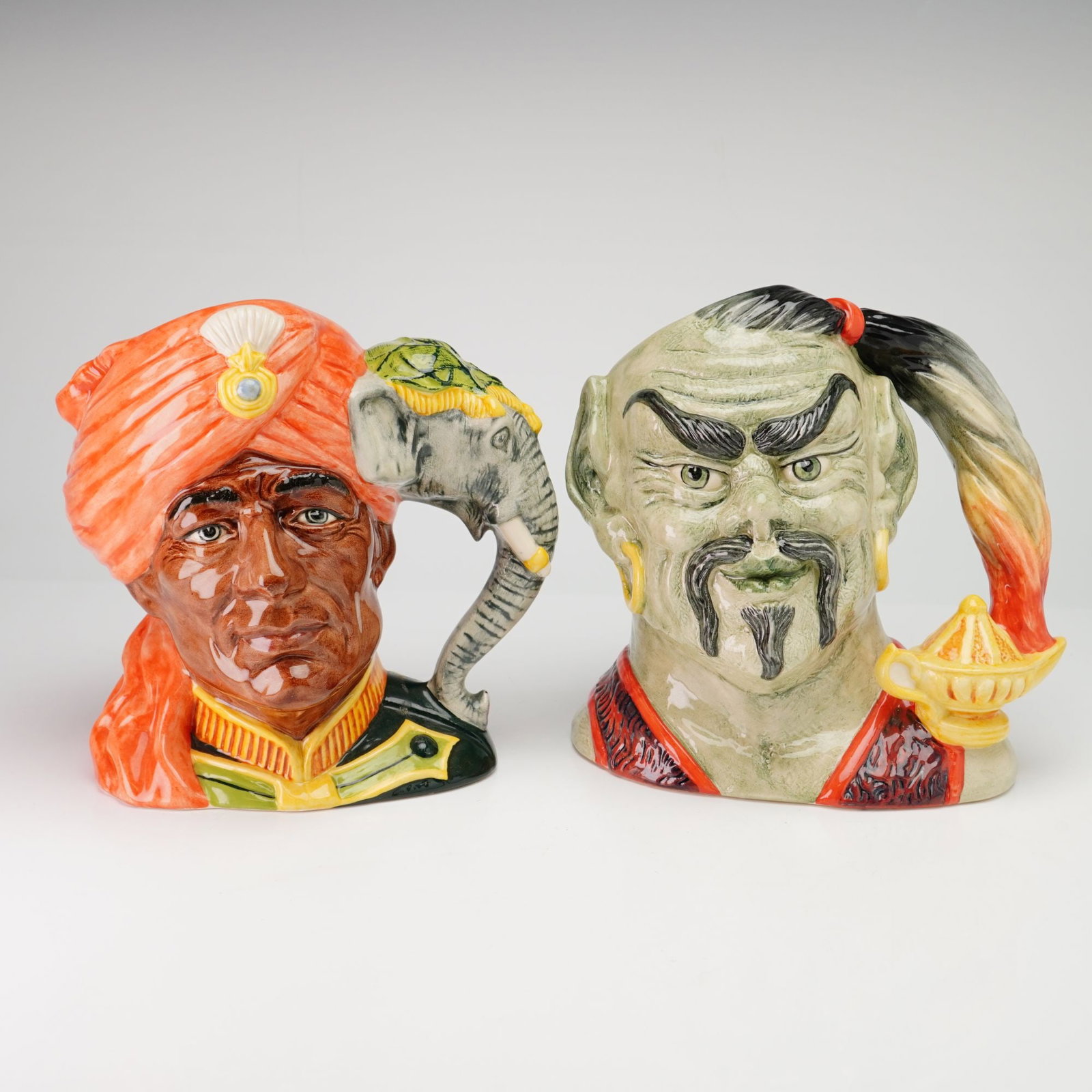 2pc Royal Doulton Character Jugs, The Elephant Trainer Signed Limited Edition and The Genie (1 of 3)