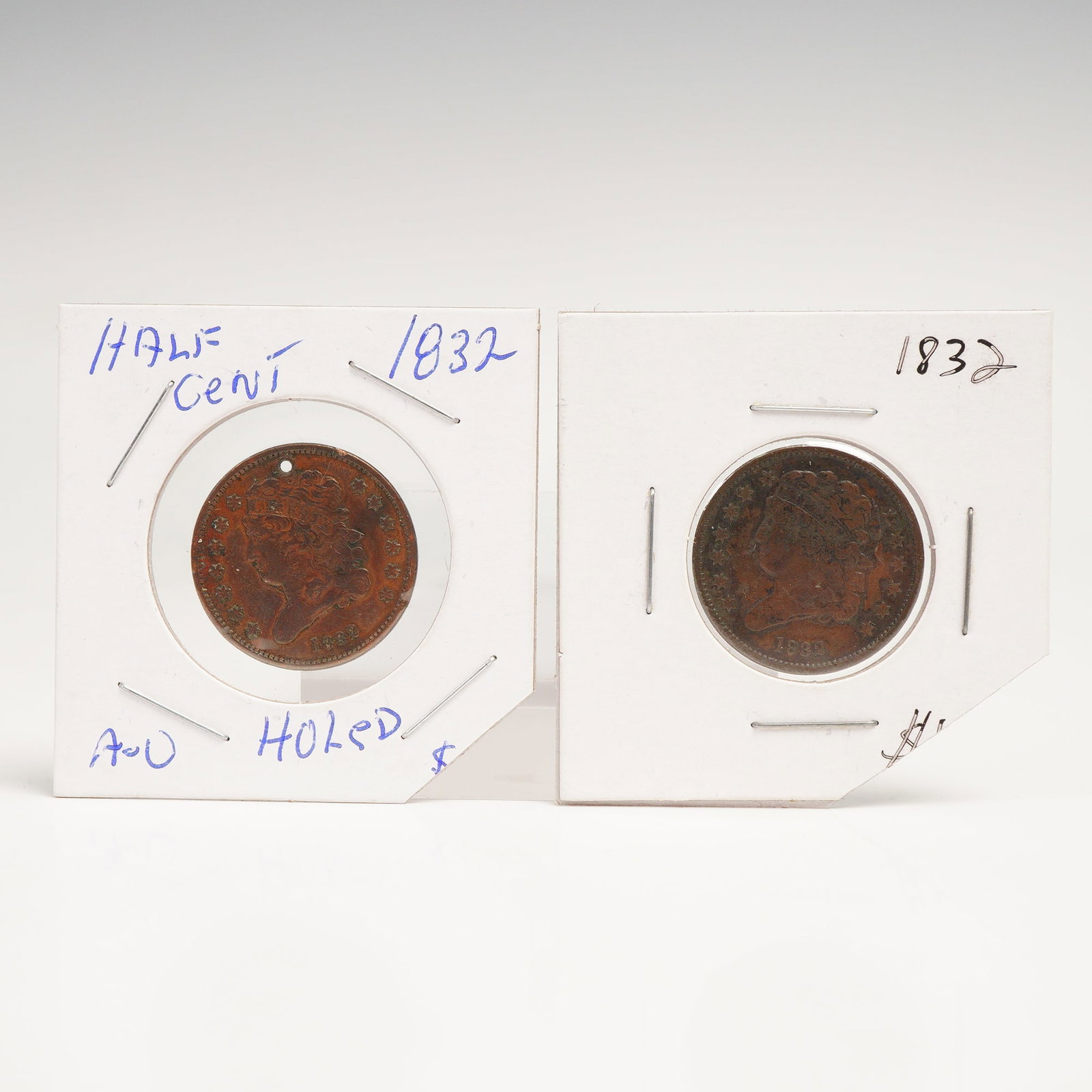2pc 1832 United States Classic Head Half Cent Coins: Composed of copper, each coin is dated 1832 and the obverse showcases the Liberty portrait with the date below and surrounded with thirteen starts. The reverse of each coin exhibits the laurel wreath 