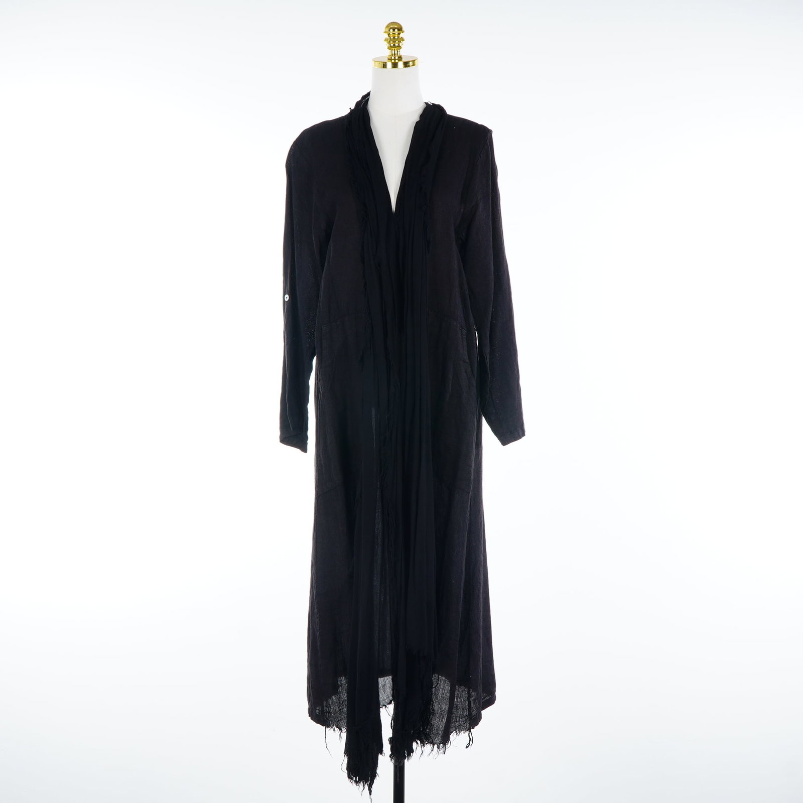 Gigi Moda Handmade in Italy Black Open Duster Cardigan One Size: This Italian-made duster by Gigi Moda is crafted from a lightweight, semi-sheer black woven fabric. The garment features an open-front construction with a draped neckline extending into integrated sca