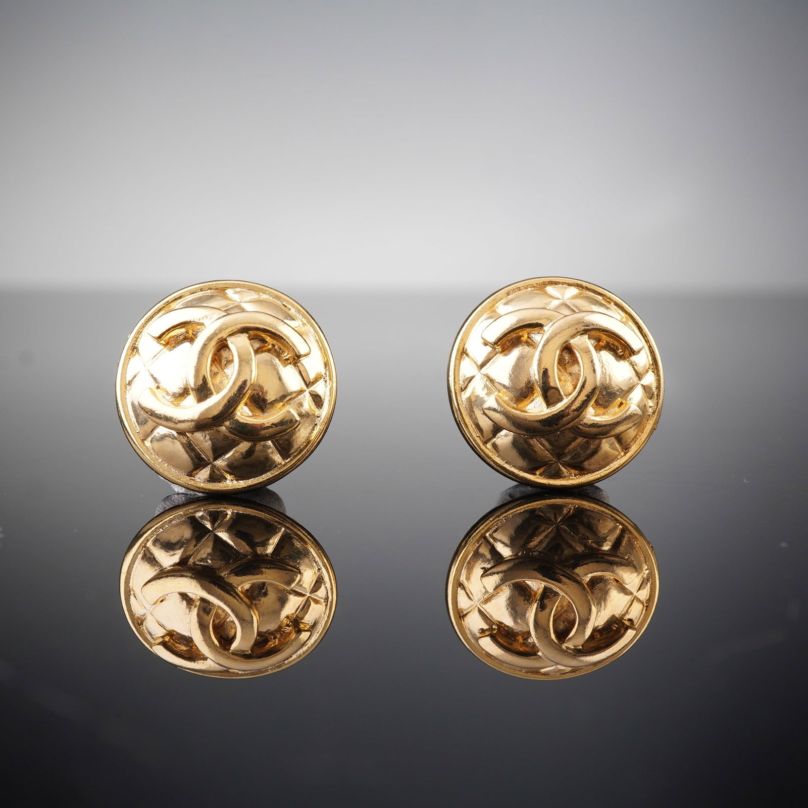 A Pair of CHANEL Gold-Tone CC Quilted Round Buttons (1 of 2)