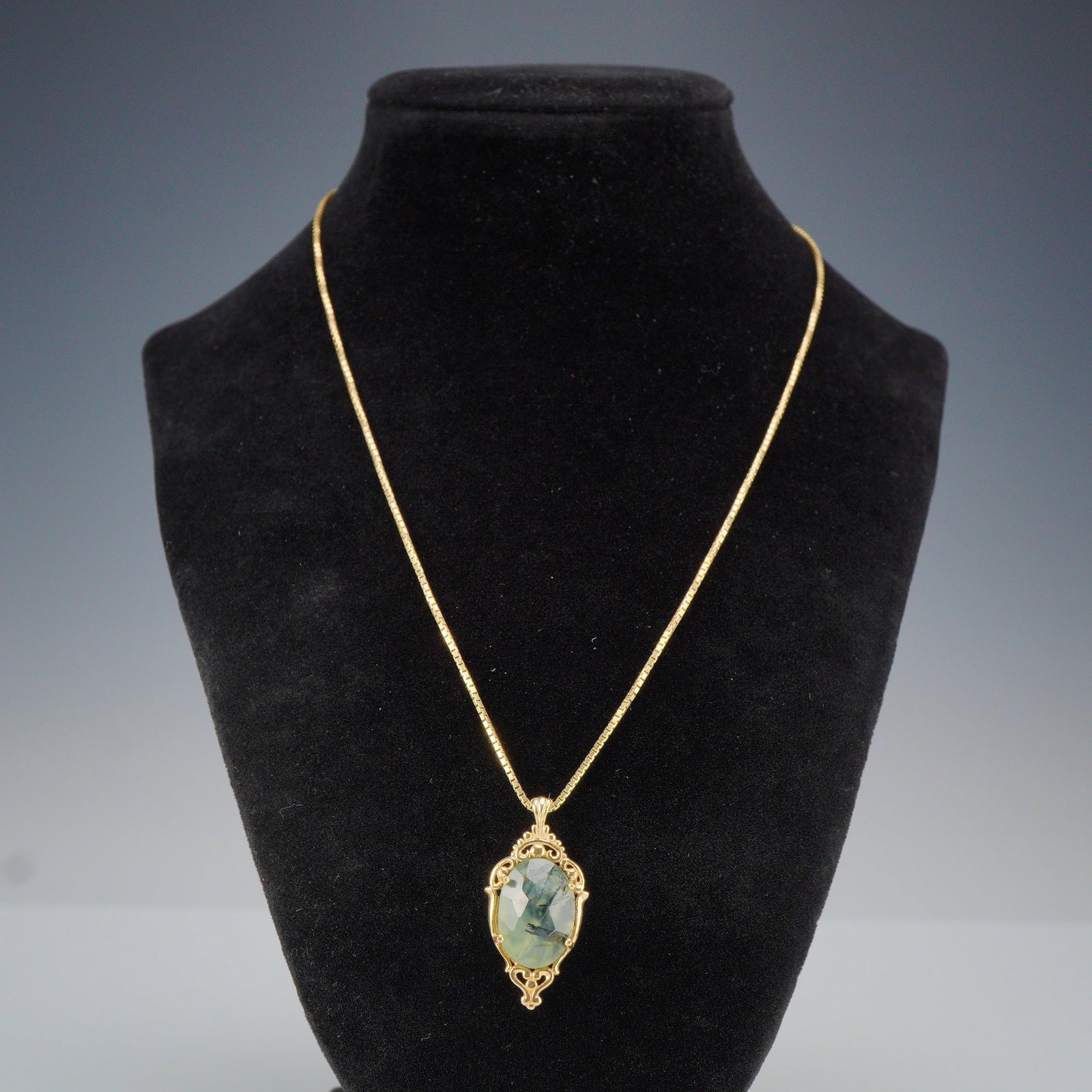 14K Yellow Gold Moss Agate Necklace: Eye catching vintage 14K gold moss agate pendant on a 14K gold chain. Both pieces are marked 14K along with illegible maker's marks, Chain measures 18" full length, pendant is 1.5"H x 0.75"L. Dimensio