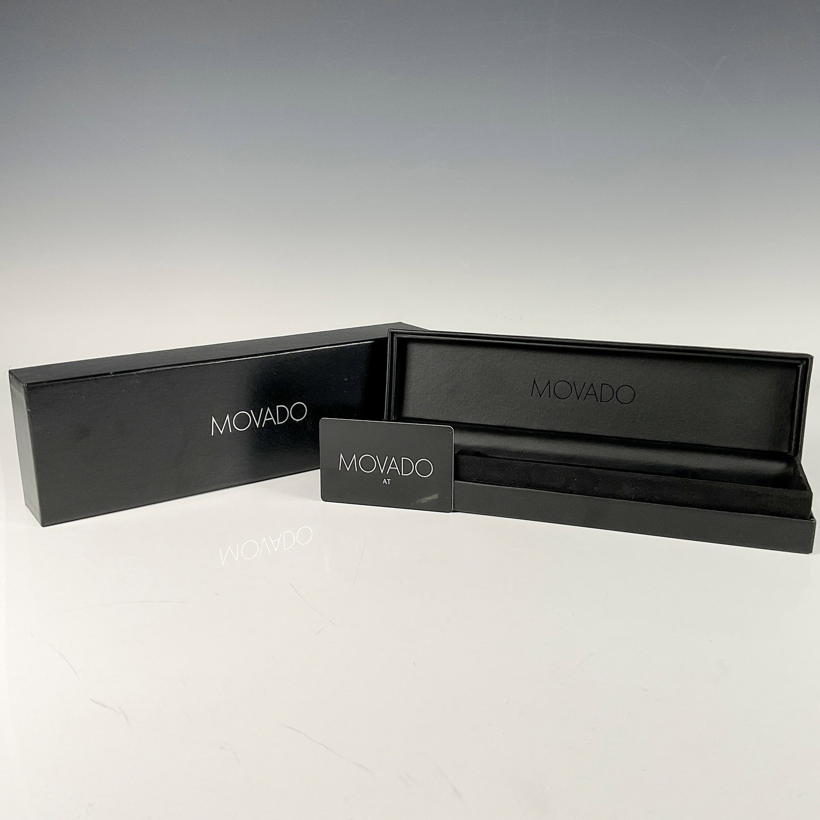 Original Movado Luxury Watch Black Box w/ Protective Case: Original Movado watch luxury black box with protective case and limited warranty protection card. Closed box dimensions: 10.50"L x 2"H x 3"W. Open box dimensions: 10.50"L x 3.50"H x 3"W. Dimensions: S