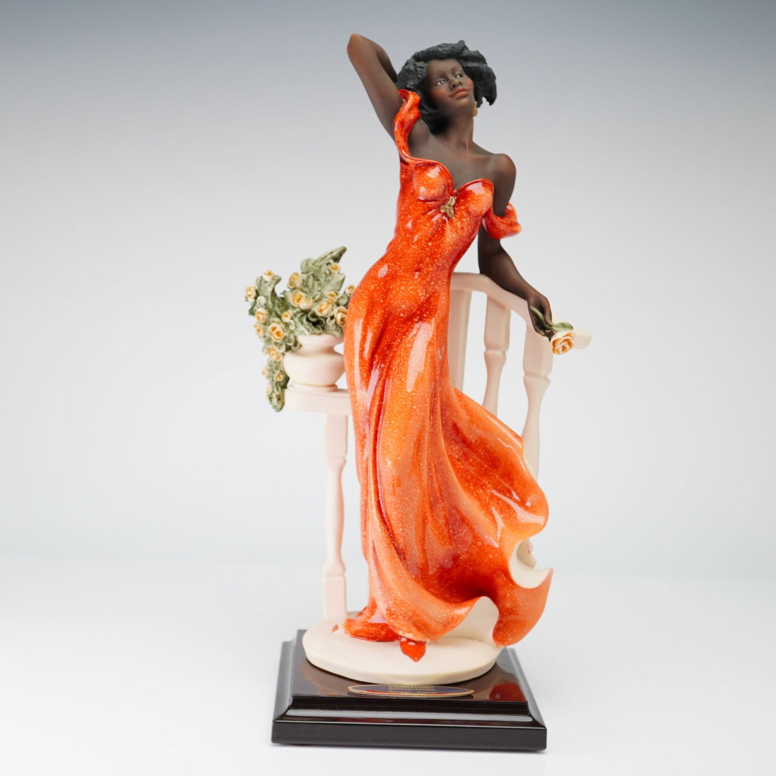 Giuseppe Armani Florence Limited Edition Figurine Summertime 1465C: This cold-cast porcelain figurine, titled Summertime, is part of the Unforgettable collection designed by artist Giuseppe Armani for the Florence Sculture d'Arte studio in Italy. The sculpture depicts