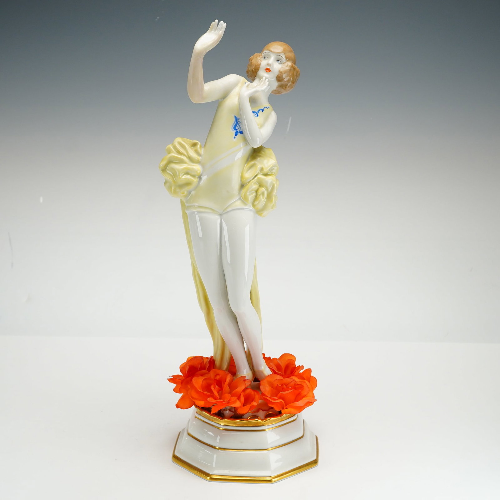 Rosenthal Art Deco Porcelain Figurine Janine by Dorothea Charol: This Art Deco porcelain figurine, titled Janine, was designed by artist Dorothea Charol for Rosenthal. The hand-painted polychrome glazed porcelain figure depicts a woman in a theatrical pose wearing 