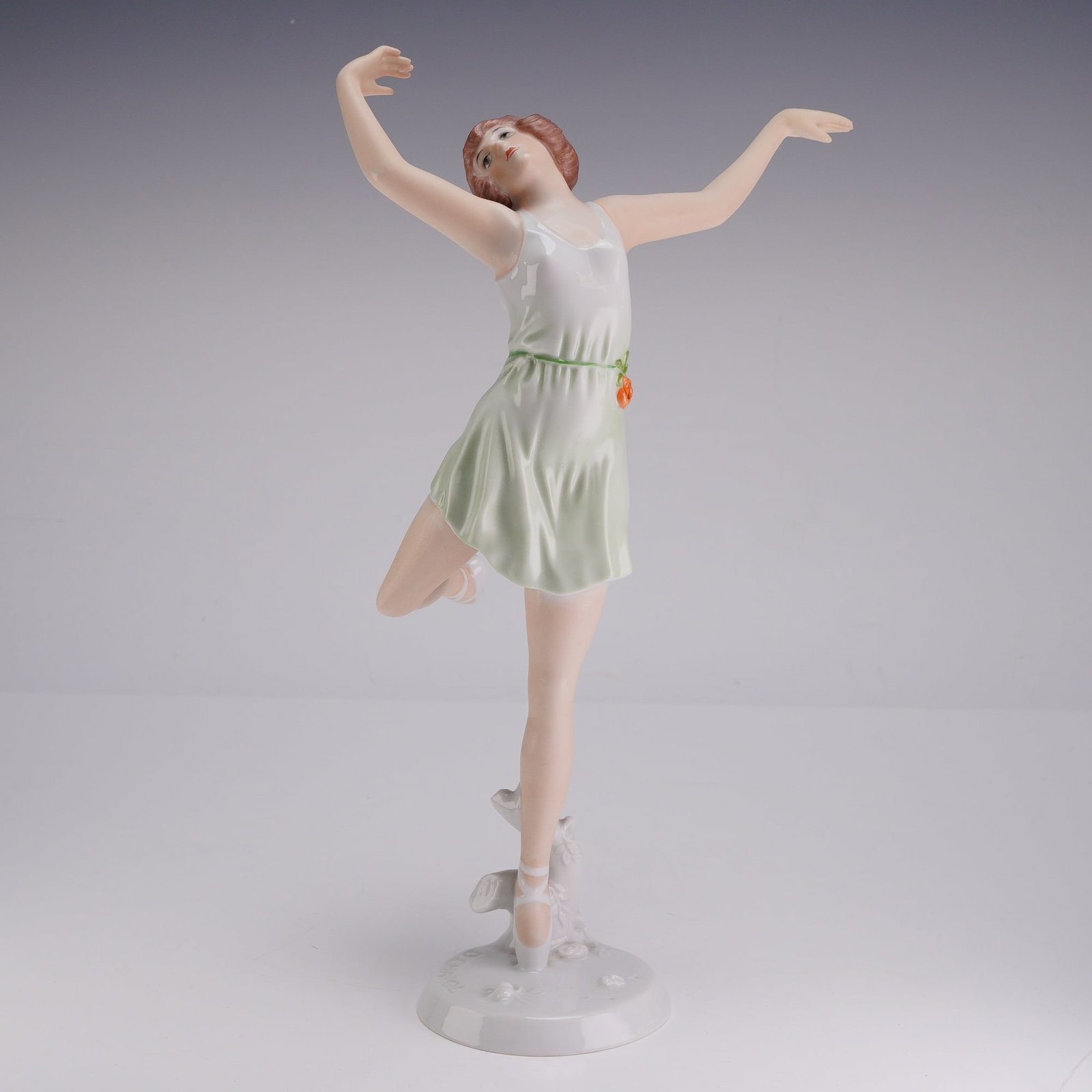 Rosenthal Art Deco Porcelain Figurine The Spring by Dorothea Charol: This glazed and hand-painted porcelain figurine, titled The Spring, was designed by artist Dorothea Charol for the Rosenthal porcelain factory in Selb, Germany. The figure depicts a female dancer in a