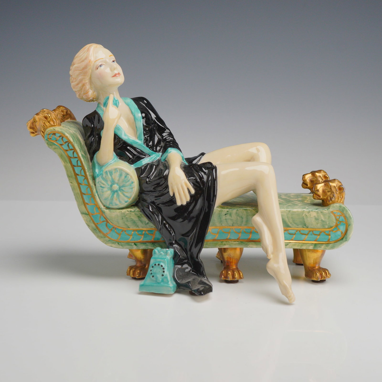 Kevin Francis Peggy Davies Special Jade Colorway The Greta Garbo Figurine: This glazed ceramic figurine, titled The Greta Garbo Figure, is part of the Twentieth Century Icons Series produced by Kevin Francis Ceramics in collaboration with Peggy Davies Ceramics. The piece was