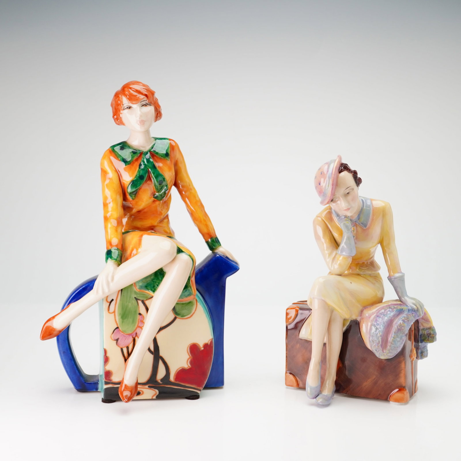Two Kevin Francis and Peggy Davies Ceramic Sculptures, Clarice Teatime and Artist Original Proof: This lot consists of two hand-painted glazed ceramic figurines manufactured in Staffordshire, England. The first figurine, titled Clarice Teatime, was modeled by Andy Moss for Peggy Davies Ceramic Scu