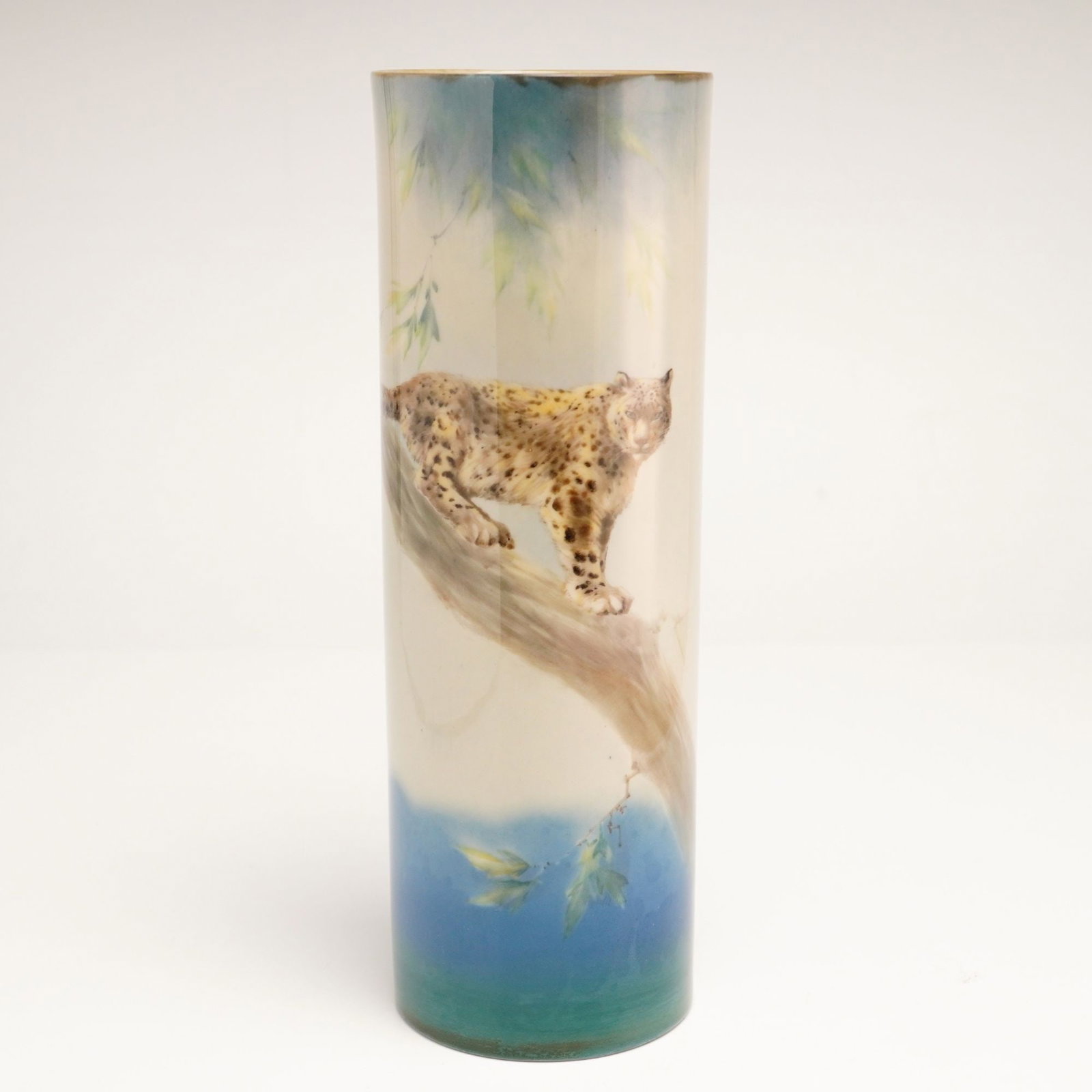 Royal Doulton by Harry Allen, Very Rare Titanian Cylinder Vase, Snow Leopard: Showcasing a sleek monochrome palette inspired by the natural beauty of its namesake. The design is accentuated by the distinctive titanium finish, lending a subtle iridescence and modern sophisticati