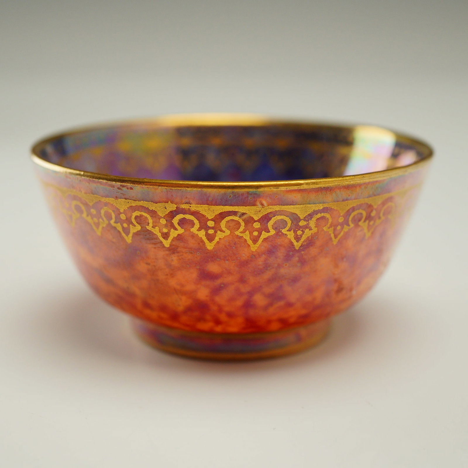 Wedgwood Fairyland Lusterware Mini Bowl, Z4825: This Wedgwood Fairyland Lusterware footed bowl vase was designed by Daisy Makeig-Jones in the early 20th century. The porcelain vessel features a high-glaze iridescent luster finish throughout. The ex