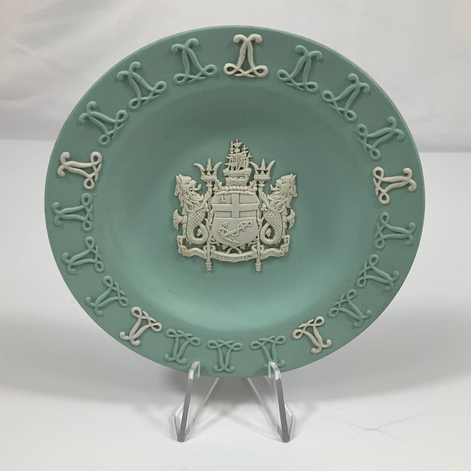 Wedgwood Jasperware Lloyd's of London Tercentenary Commemorative Pin Dish: This item is a Wedgwood jasperware commemorative pin dish produced to mark the tercentenary of Lloyd's of London. The small circular saucer is crafted from sea green matte unglazed stoneware. The cent