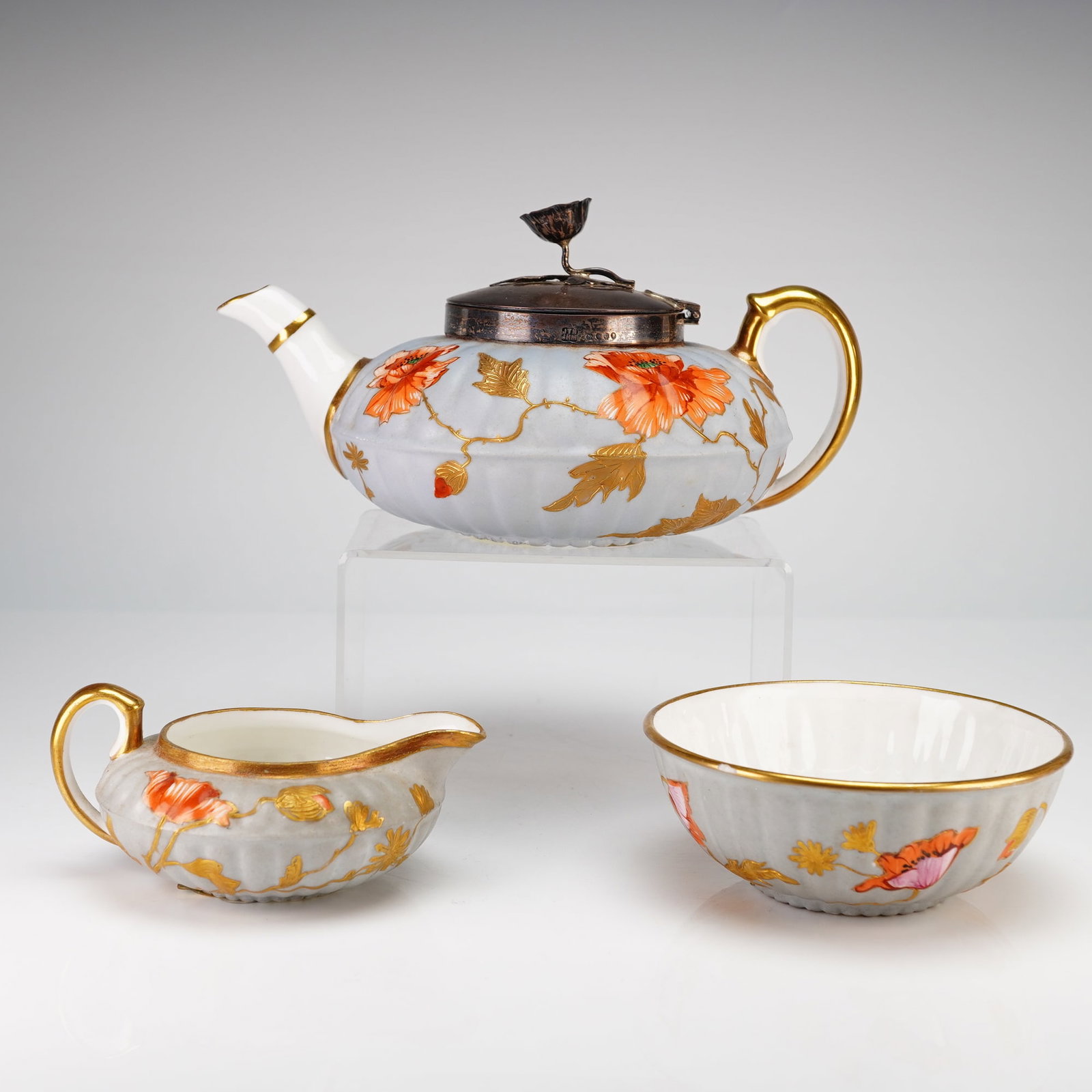 A Three-Piece Wedgwood Blue Field Porcelain Tea Set with Sterling Silver Lid and Poppy Finial (1 of 5)