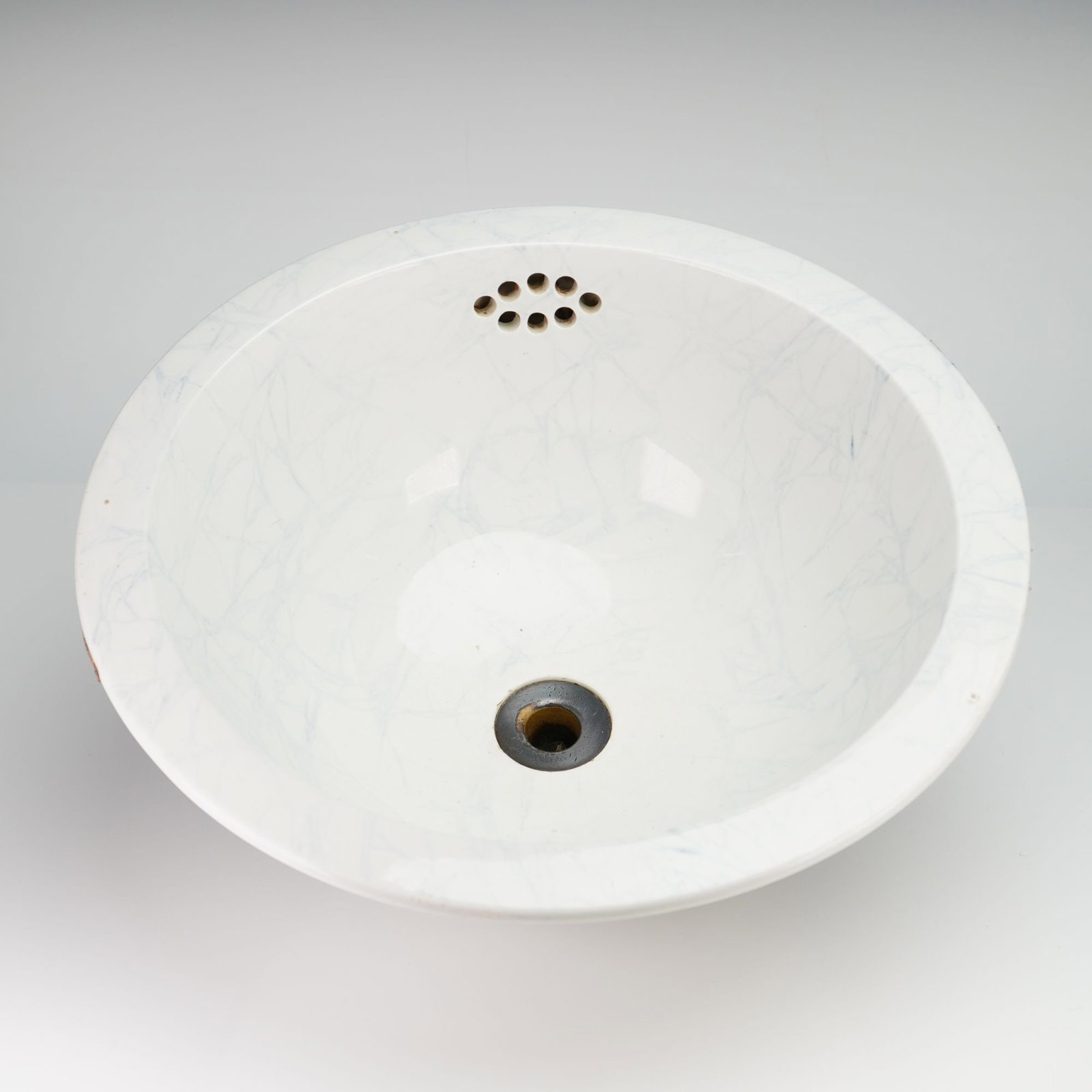 Wedgwood Pearlware Ceramic Inset Sink Basin: A mid-19th century Victorian-era ceramic inset sink basin manufactured by Wedgwood. The circular basin is constructed of pearlware, a white earthenware body characterized by a slightly bluish glaze. T