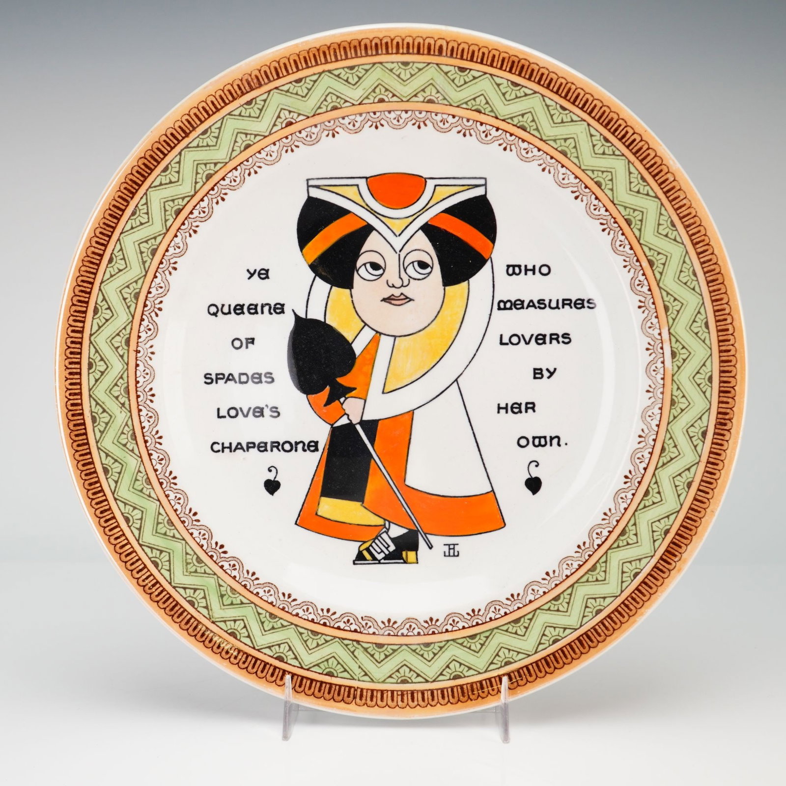 Wedgwood Augustus Jansson Playing Card Plate, Queen of Spades: This circular earthenware plate is part of the Playing Card series produced by Wedgwood at the Etruria works in England. The design is by American illustrator Augustus L. Jansson of West Somerville, M