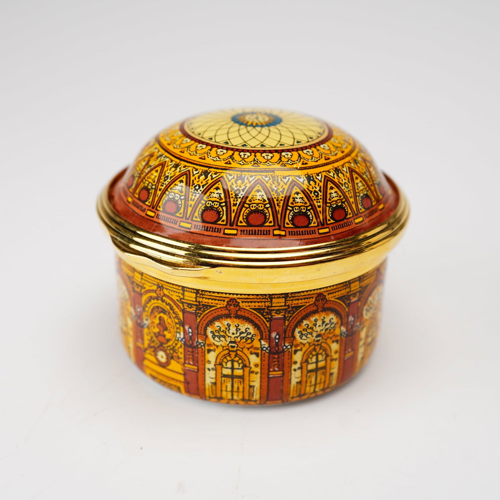 Halcyon Days for St. James Place Enamel Treasure Box, Celebrating 25 Years Paris: A Halcyon Days English Enamel treasure box commissioned for St. James's Place Wealth Management. This circular trinket box is constructed of hand-decorated enamel over a copper form with a hinged gilt