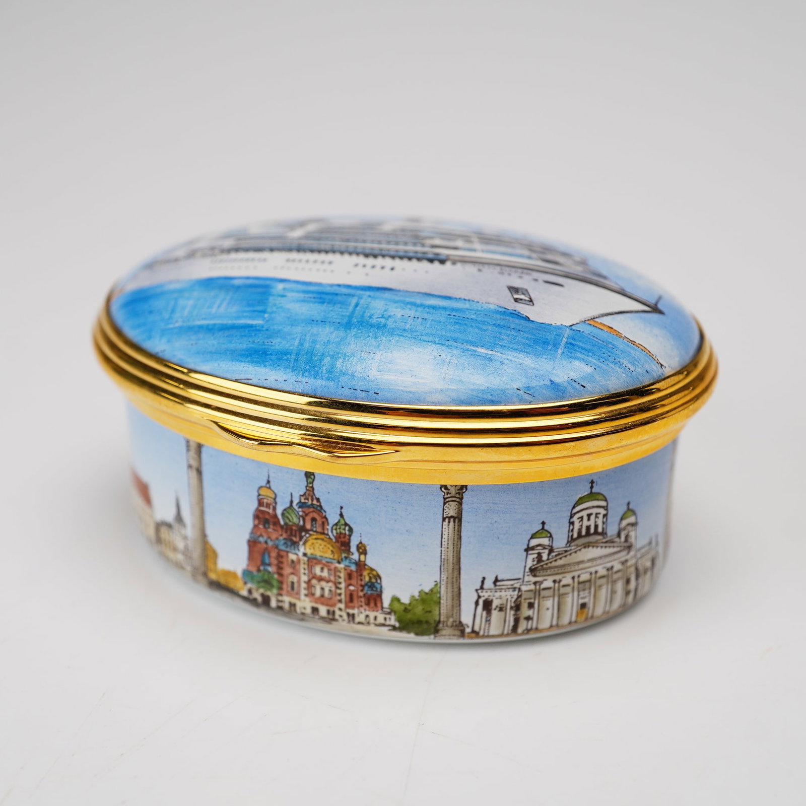 Halcyon Days for St. James Place Limited Edition Enamel Treasure Box, White Nights Cruise 2011: Halcyon Days English Enamel treasure box produced for the White Nights Cruise 2011. This limited edition oval hinged box is constructed of enamel on copper with gilded metal mounts. The lid is decorat