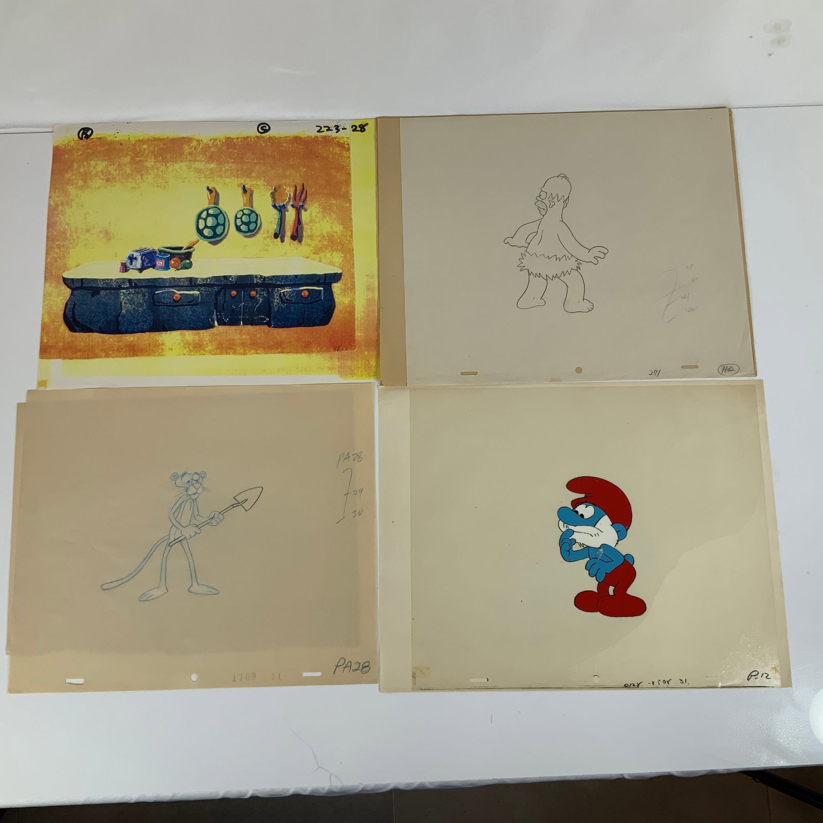 Original Animation Production Art from The Simpsons, Smurfs, and Pink Panther (1 of 2)
