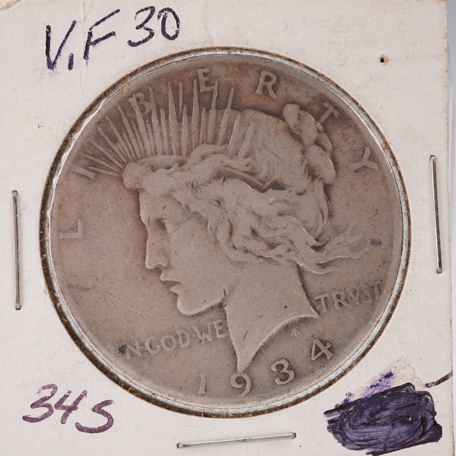 1934 Peace Silver Dollar: Offered here is a 1934 Peace Silver Dollar. The obverse displays Liberty crowned with rays of light, along with the inscriptions LIBERTY, IN GOD WE TRVST, and the year 1934. The reverse depicts an eag