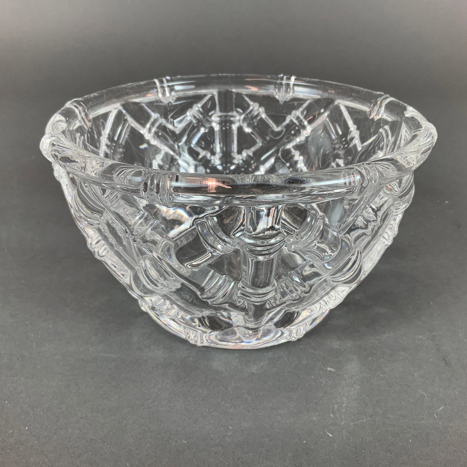 Tiffany and Co. Bamboo Pattern Crystal Glass Bowl: A clear lead crystal bowl by Tiffany and Co. featuring the Bamboo pattern. The exterior is decorated with a molded lattice design of intersecting bamboo stalks and raised nodes. The rim is scalloped t