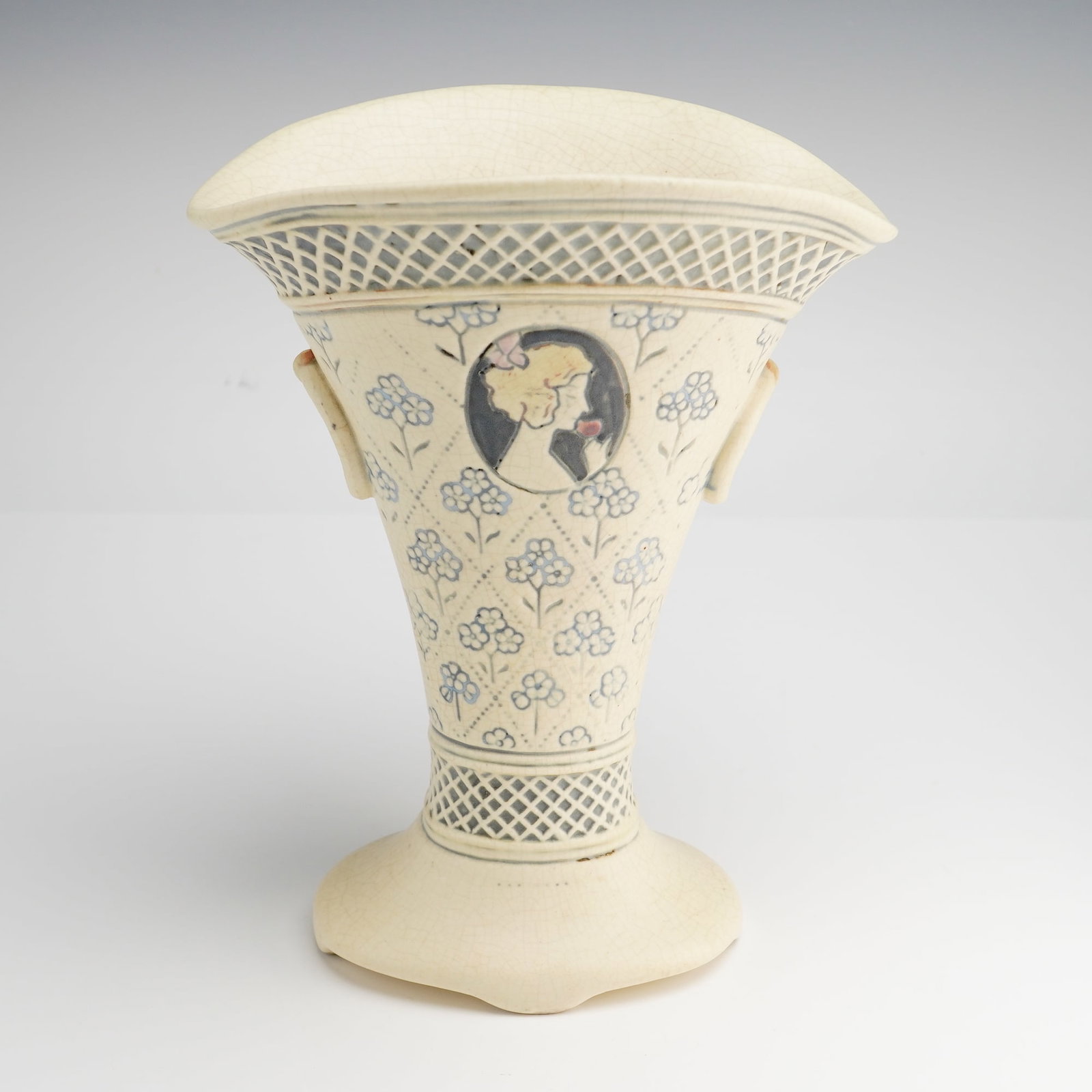Weller Pottery, Art Deco Style, "Ethyl" Creamware Fan Vase: An American art pottery footed fan-shaped vase from the "Ethyl" line (occasionally referenced as "Ethel") by Weller Pottery, Zanesville, Ohio, circa 1916. This creamware piece features a flared,