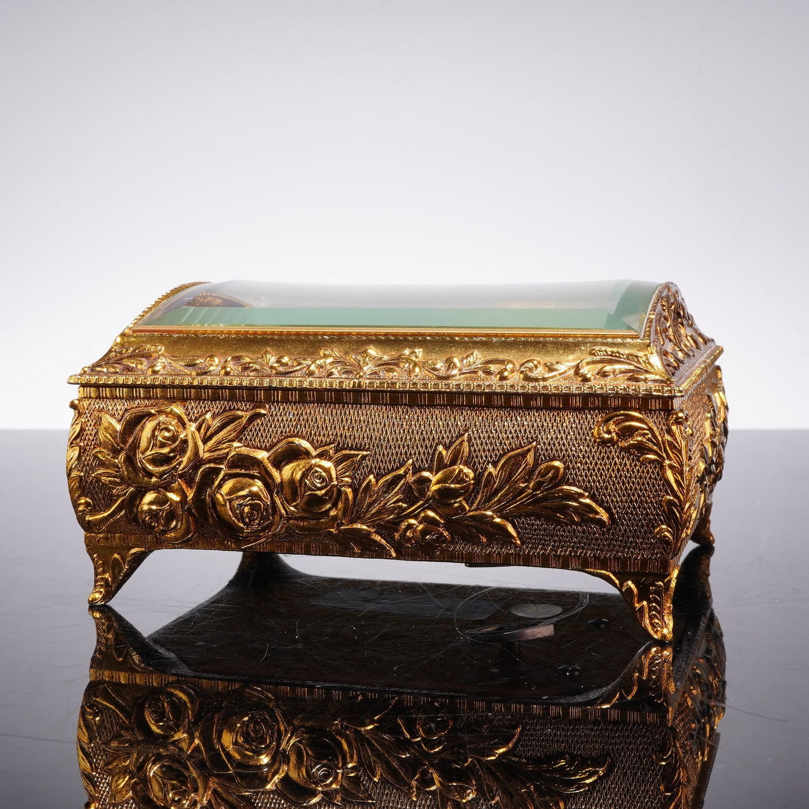 Westland Japan Gold-Tone Rococo Revival Hummingbird Automaton Musical Jewelry Box: This musical jewelry box was produced in Japan and imported by the Westland Company of San Leandro, California. The rectangular case is constructed of cast metal with a bright gold-tone finish, design