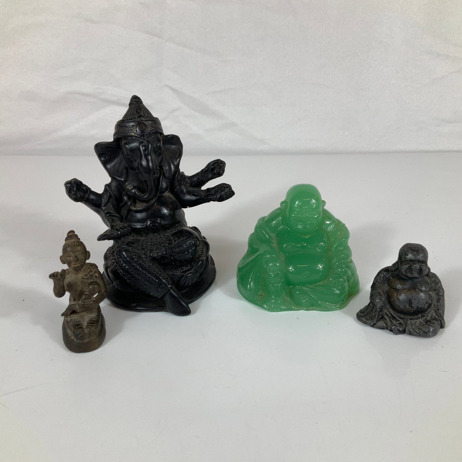 4pc Religious and Spiritual Figurines Including Ganesha, Laughing Buddha, and Miniature Burmese (1 of 3)