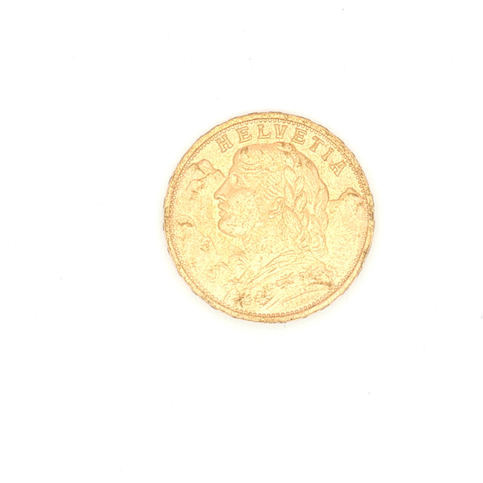 1947 Switzerland 20 Francs Vreneli Gold Coin: Minted by Bern, Switzerland. The obverse depicts bust of young woman left-facing with tresses and a garland of edelweiss. The reverse displays Coat of Arms and Oak (Quercus robur) branch with acorns a