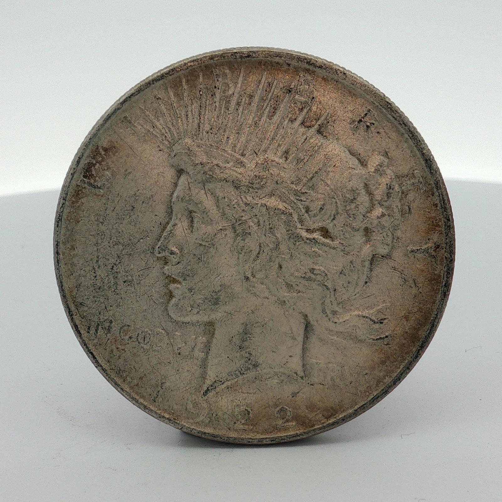 1922-D US One Dollar Peace Silver Dollar, Circulated (1 of 2)