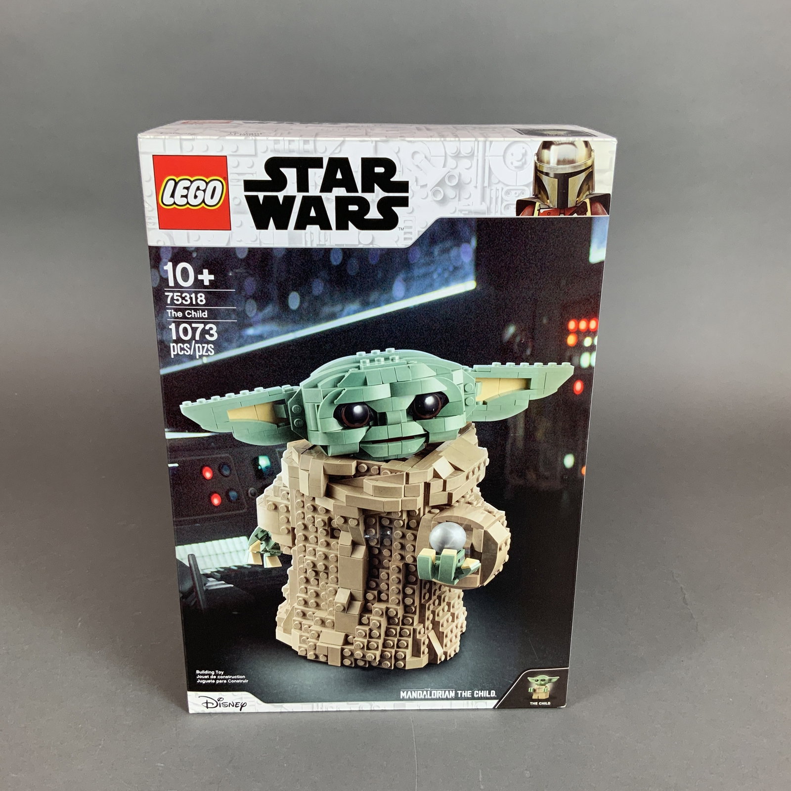 LEGO Star Wars The Mandalorian The Child Building Set 75318: This LEGO Star Wars building set, identified as set number 75318, features the character known as The Child from the series The Mandalorian. The set is comprised of 1,073 plastic pieces used to create