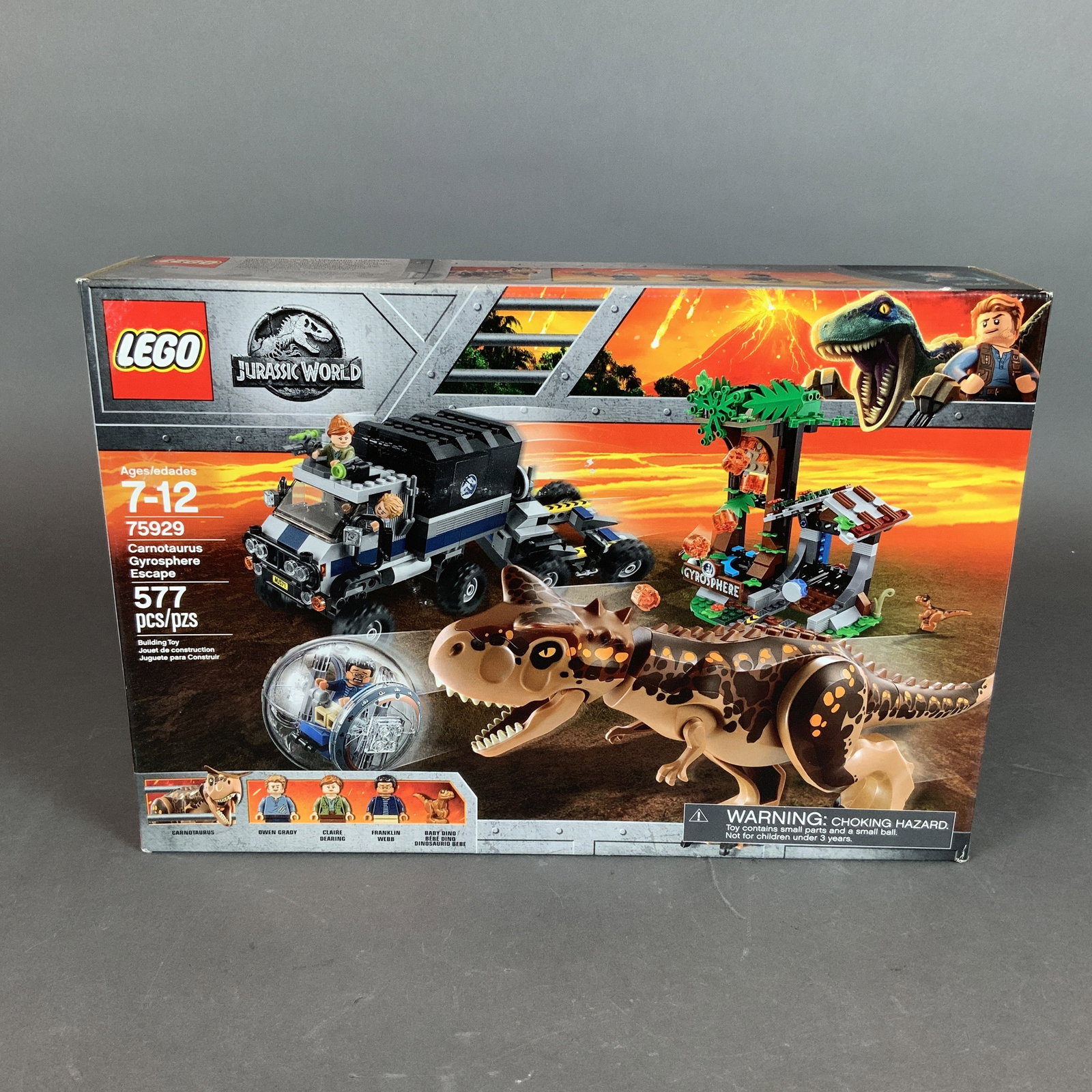 LEGO Jurassic World Set, Carnotaurus Gyrosphere Escape 75929: This LEGO building set, number 75929, is titled Carnotaurus Gyrosphere Escape from the Jurassic World theme. The set is constructed from plastic and contains 577 pieces. It includes three minifigures: