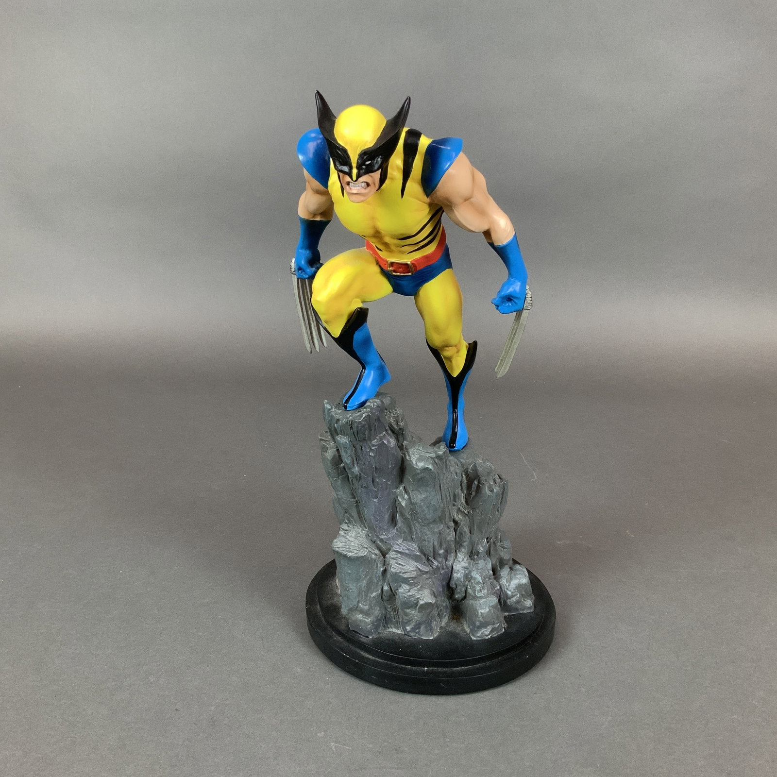Bowen Designs Marvel Painted Statue, Wolverine: A limited edition, hand-painted Marvel Wolverine statue, Classic Version, produced by Bowen Designs, Inc. in 2000. This piece was sculpted by artist Mark Newman and features the character in his tradi