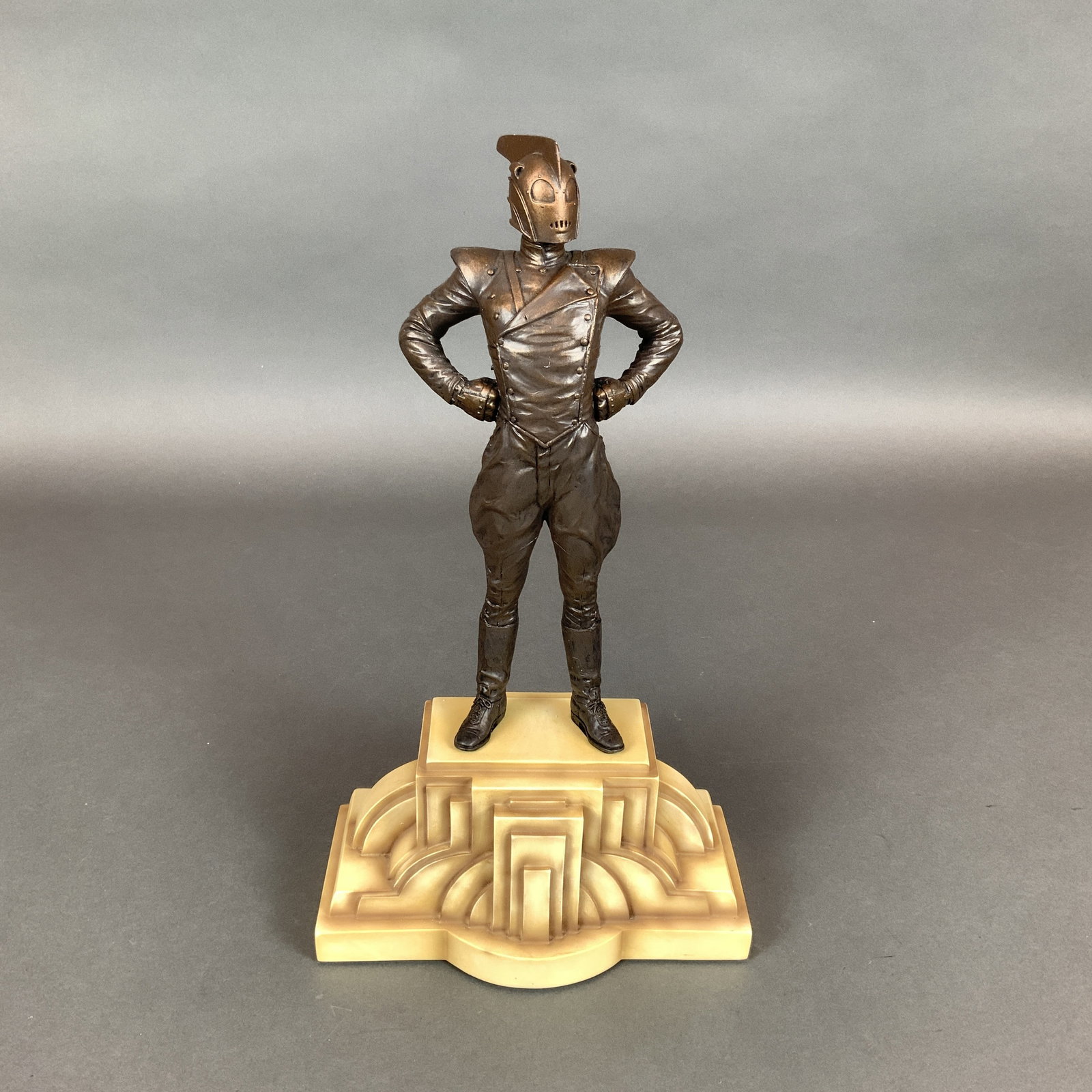 The Rocketeer Limited Edition Figurine #341 of 1000 by Bowen Designs Sculpted by Kent Melton: Produced by Bowen Designs and sculpted by Kent Melton, this cold-cast resin statue depicts The Rocketeer, the hero created by artist Dave Stevens. The figurine features a metallic bronze-toned finish 