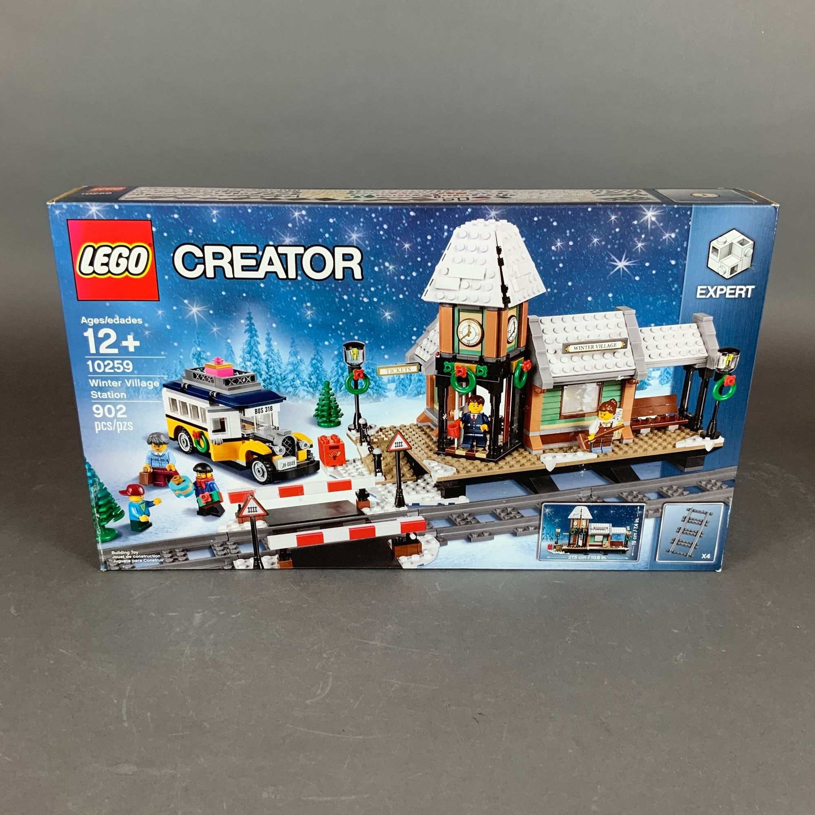 LEGO Creator Expert Winter Village Station Building Set 10259: LEGO Creator Expert Winter Village Station, set number 10259. This plastic construction toy set contains 902 pieces and is designed for ages 12 and up. The buildable model features a snow-covered trai
