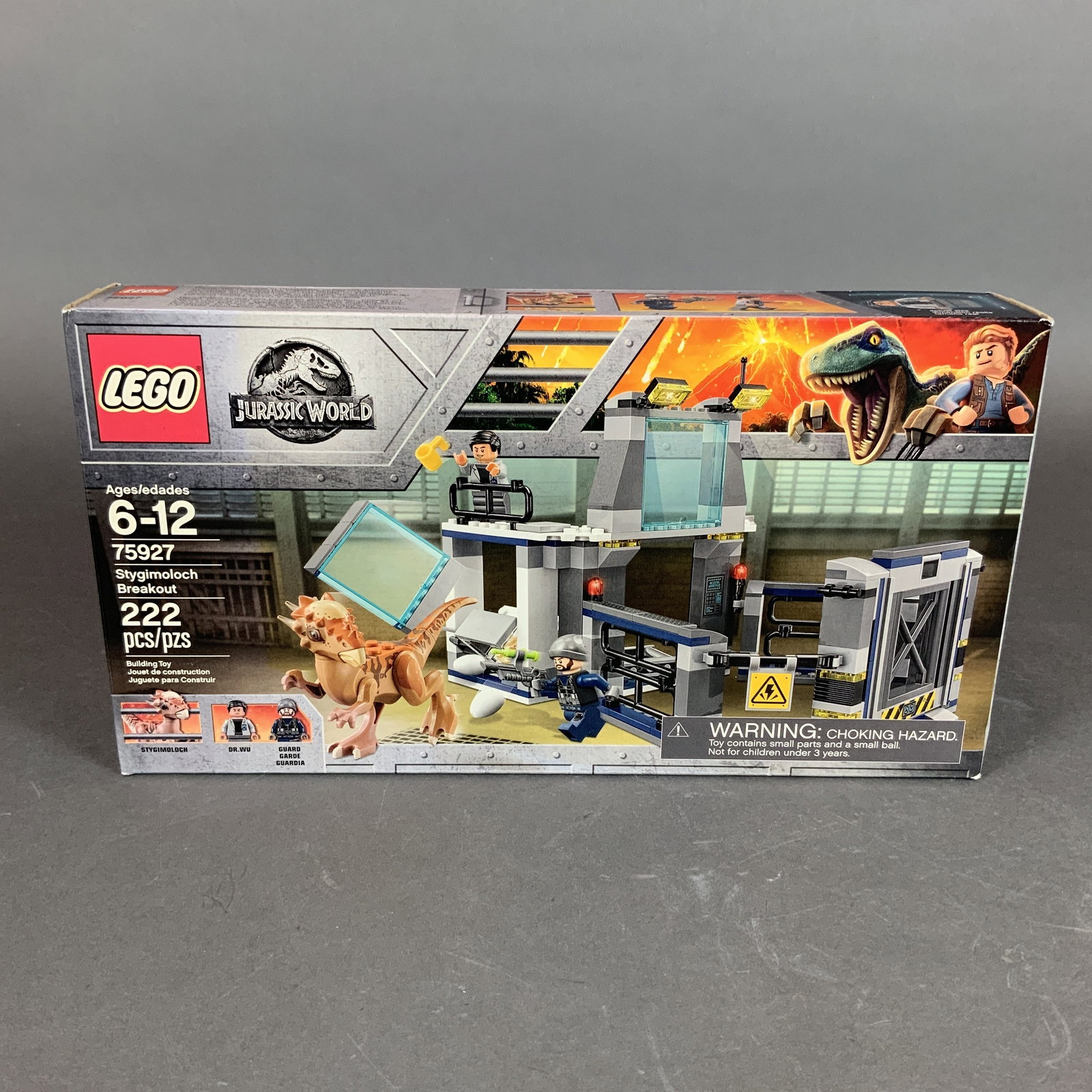 LEGO Jurassic World Stygimoloch Breakout Set 75927: This is a LEGO building set from the Jurassic World theme, titled Stygimoloch Breakout. The construction set, number 75927, is composed of 222 plastic pieces. The model includes a two-level laboratory