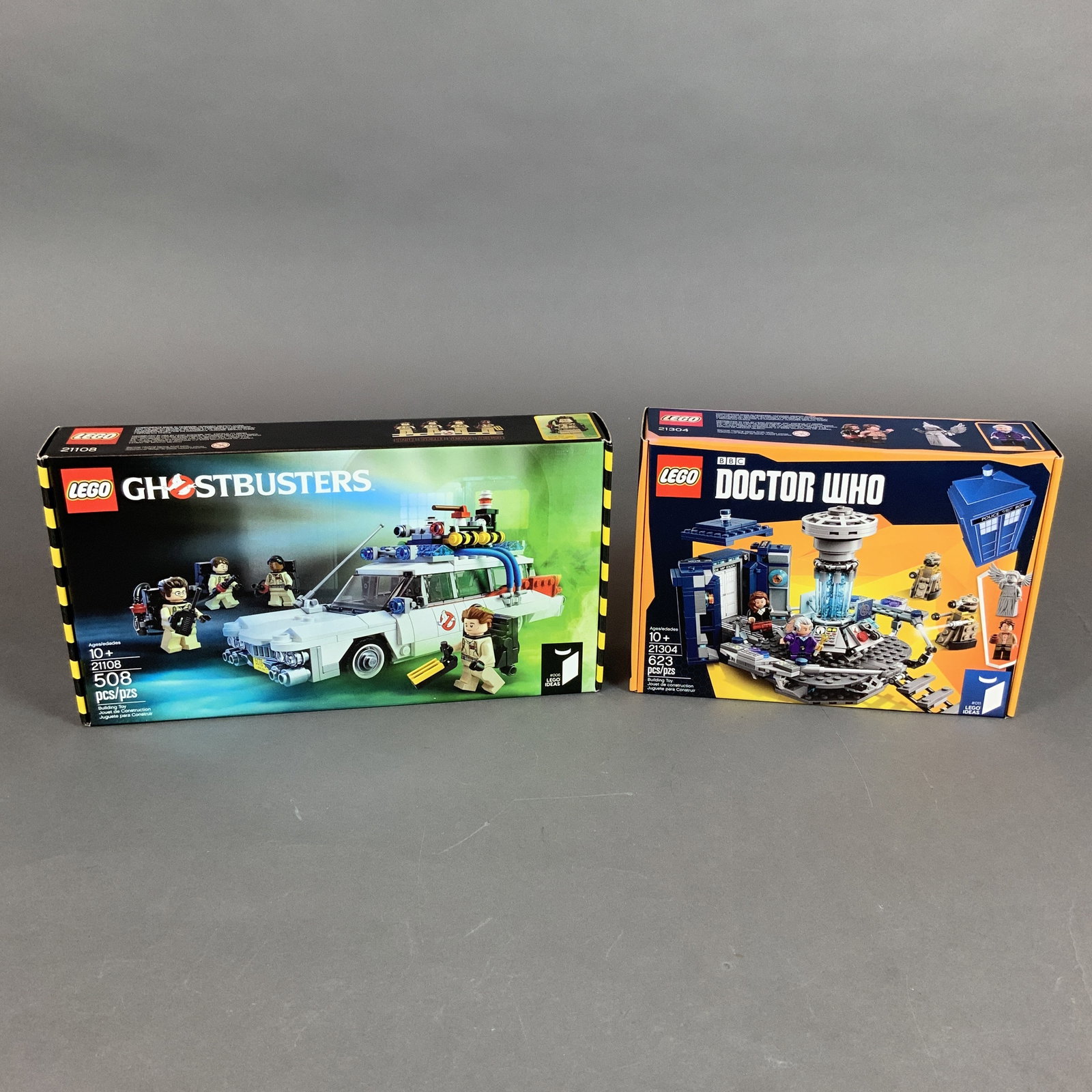 Two LEGO Ideas Building Toy Sets Doctor Who 21304 and Ghostbusters 21108: A group of LEGO Ideas building toy sets manufactured by The LEGO Group, featuring the Doctor Who and Ghostbusters franchises. Set #21304, Doctor Who, consists of 623 plastic pieces used to construct t