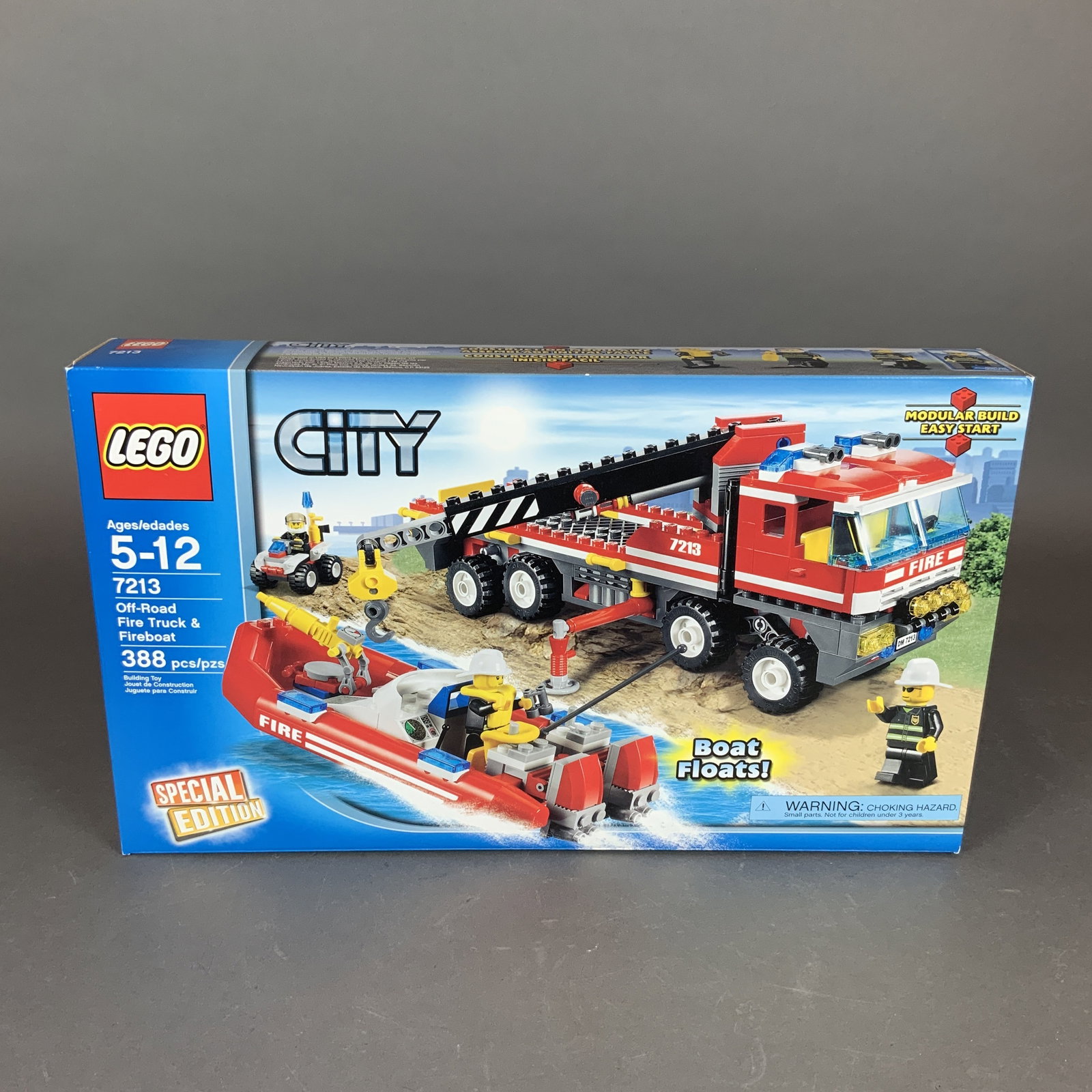 LEGO City Special Edition Set, Off-Road Fire Truck and Fireboat 7213: This LEGO set, number 7213 from the City theme, is titled Off-Road Fire Truck and Fireboat. Manufactured by The LEGO Group and released in 2010, this 388-piece plastic building set includes a large re
