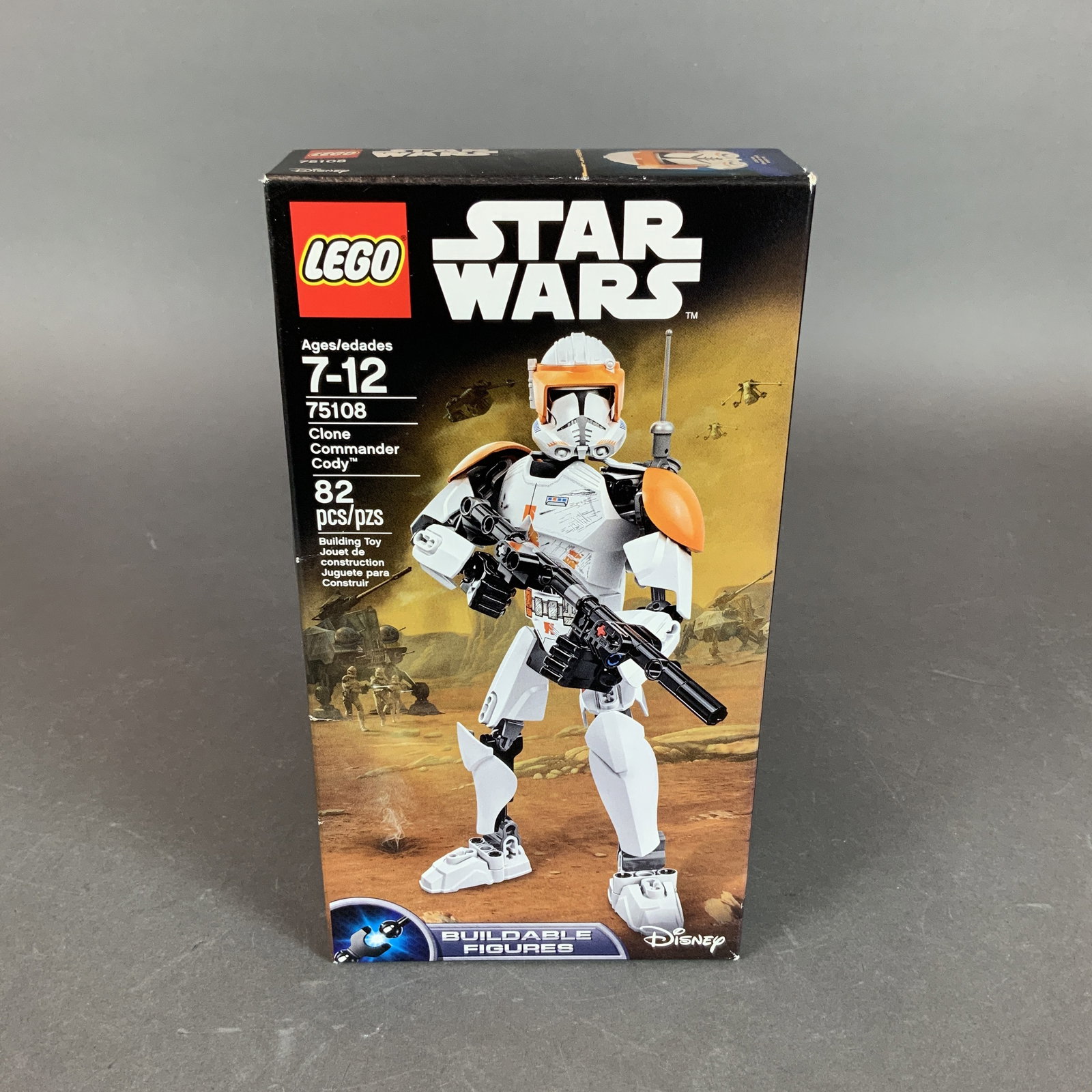 LEGO Star Wars Clone Commander Cody Buildable Figure Set 75108: This LEGO Star Wars buildable figure set features Clone Commander Cody, model number 75108. The kit consists of 82 plastic pieces used to construct a poseable figure of the character in his Phase II c