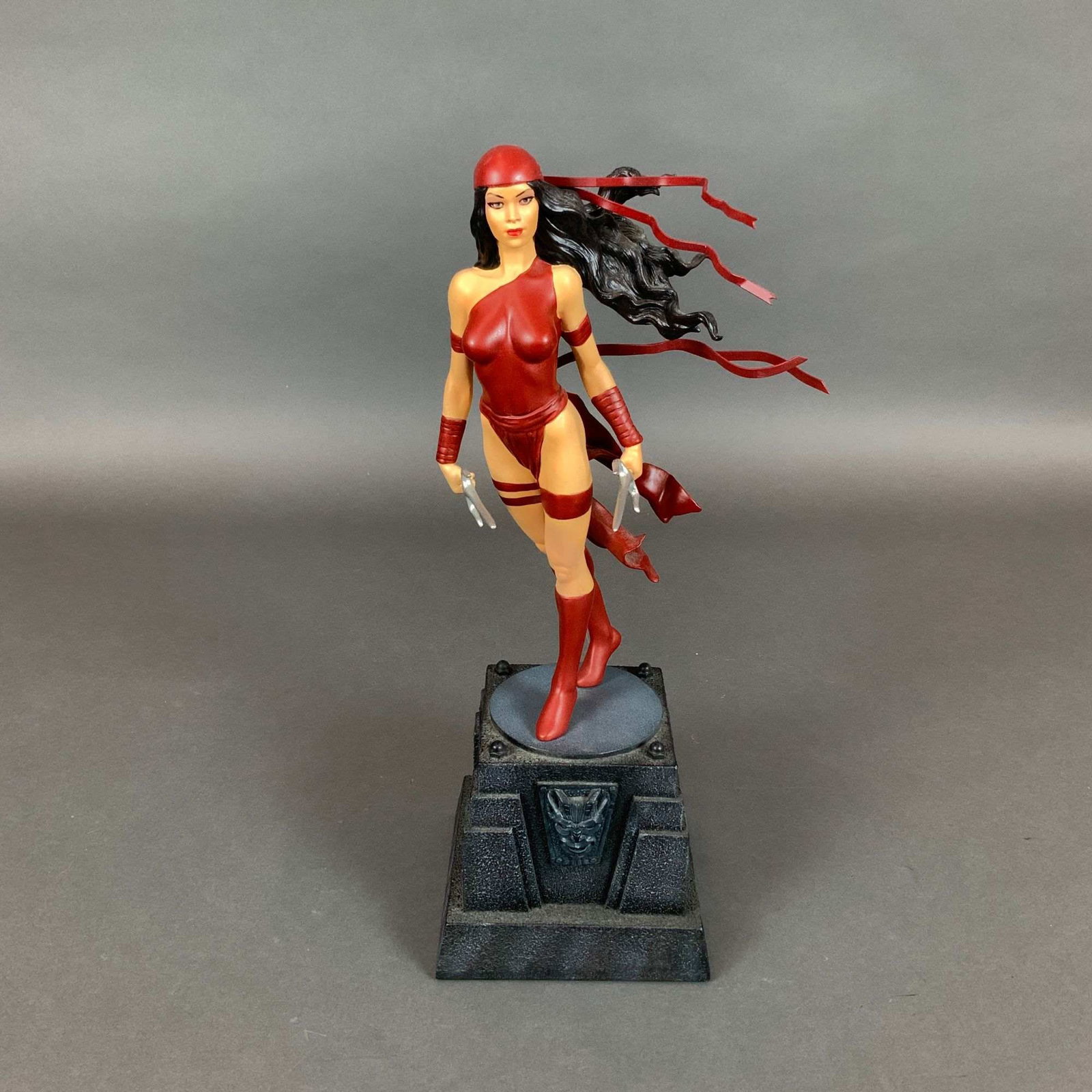 Bowen Designs Marvel Comics Painted Statue, Elektra with Box: This limited edition painted statue of the Marvel Comics character Elektra was produced by Bowen Designs and sculpted by artist Mark Newman in 2001. The character is portrayed in her classic red ninja