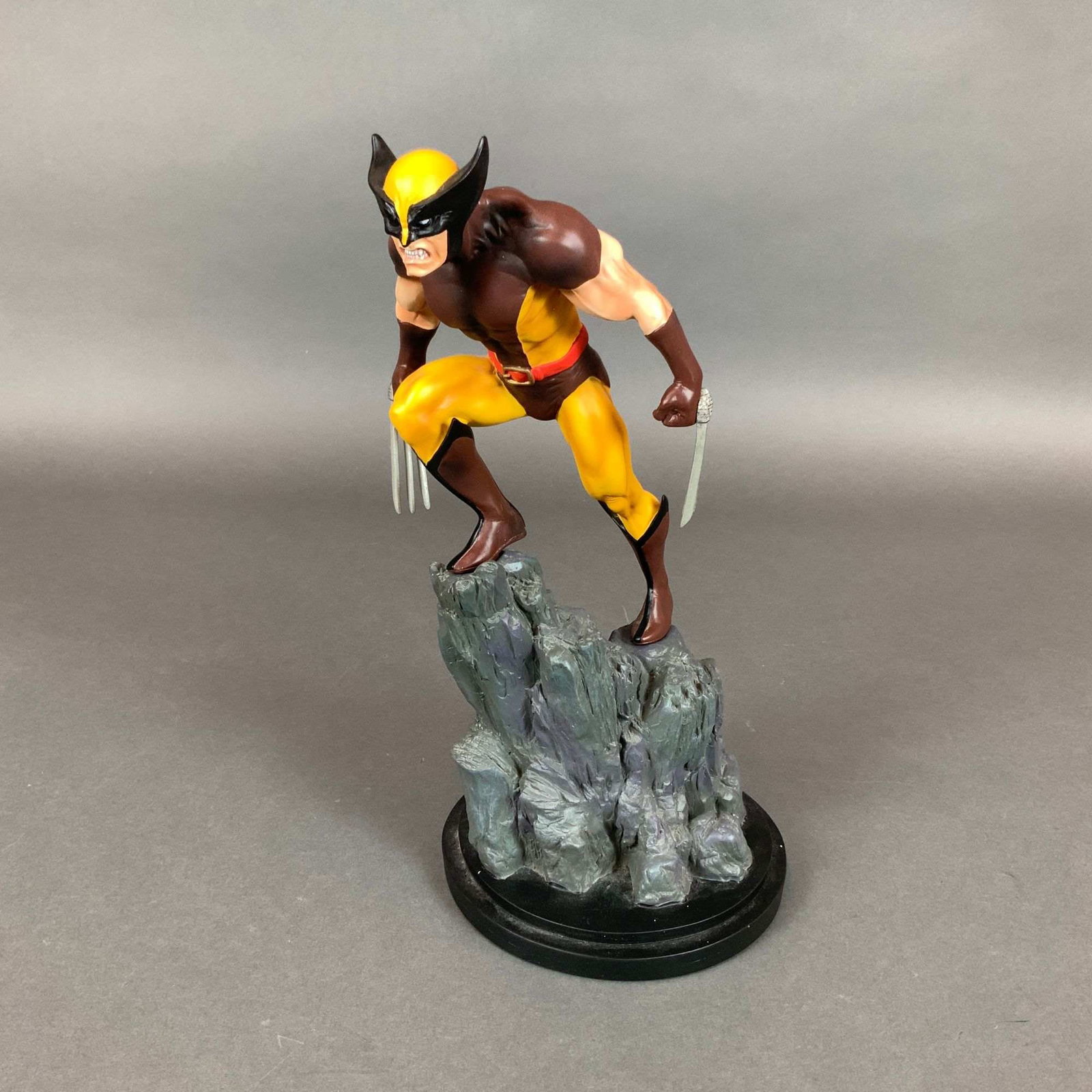 Bowen Designs Marvel Painted Statue, Wolverine Brown Version with Box: This is a limited edition 1/8th scale painted statue of the Marvel Comics character Wolverine, produced by Bowen Designs and released in 2000. The figure depicts Wolverine in his brown and tan costume